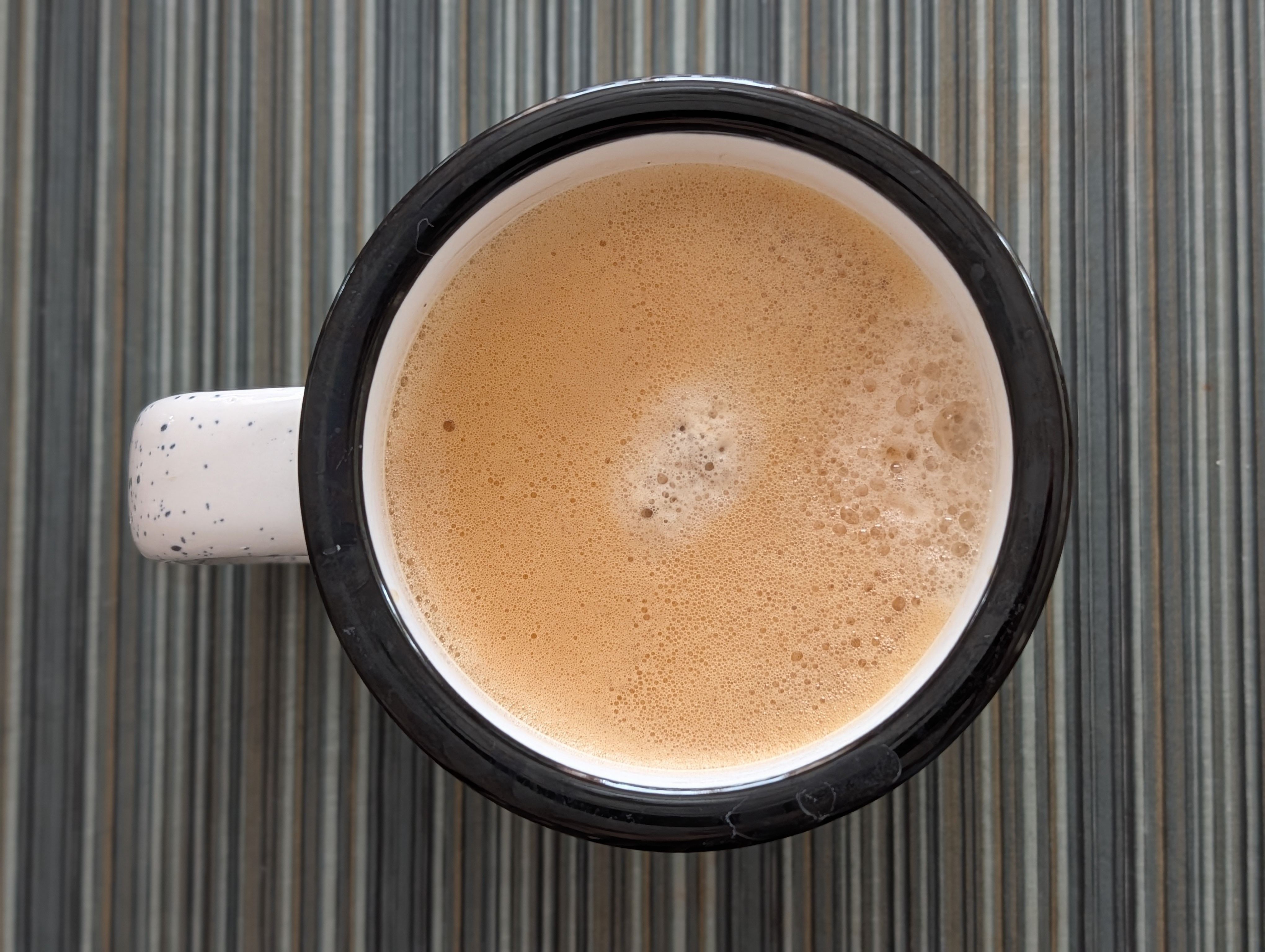 This is definitely better with a little milk.  Having a break and looking at all the snow before getting back to work.