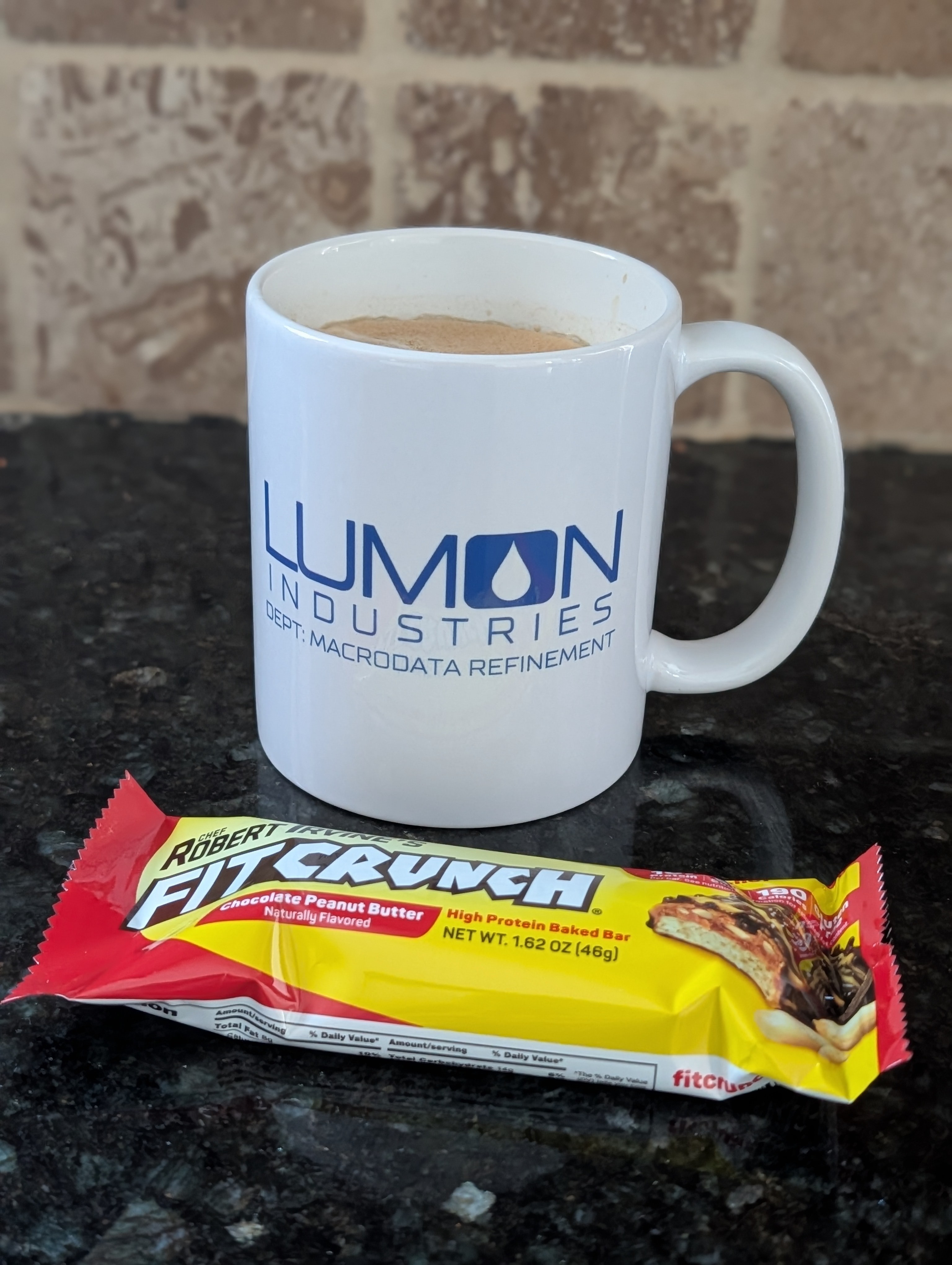 Grabbing a breakfast bar and a coffee right before the next meeting.