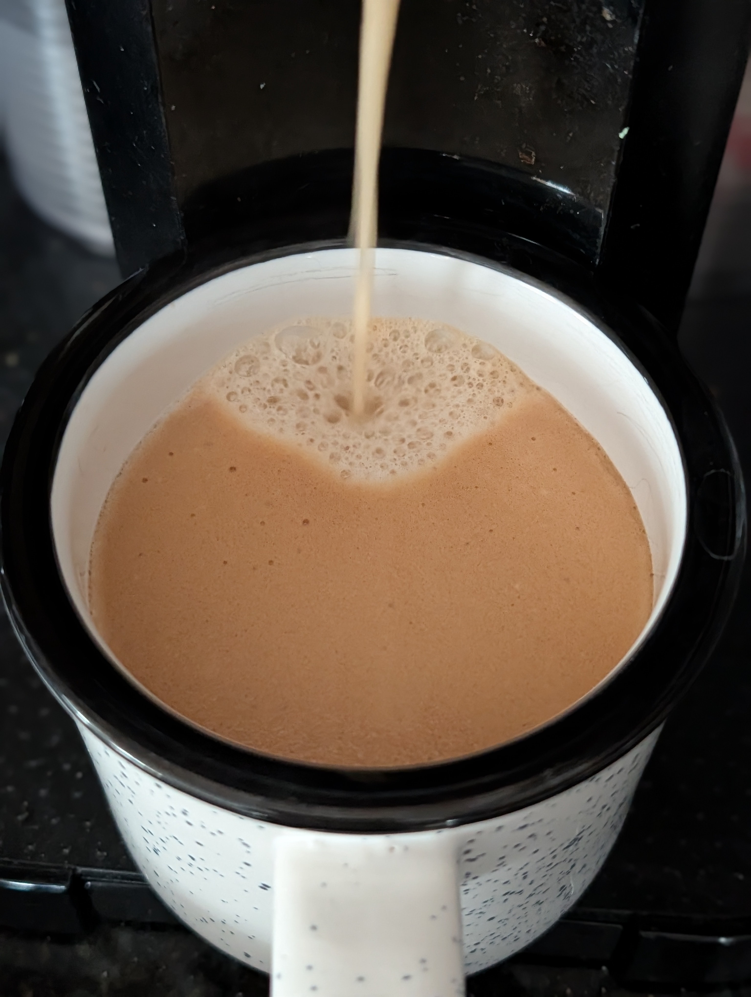 Enjoying a coffee with some free time to recharge before the barrage of meetings