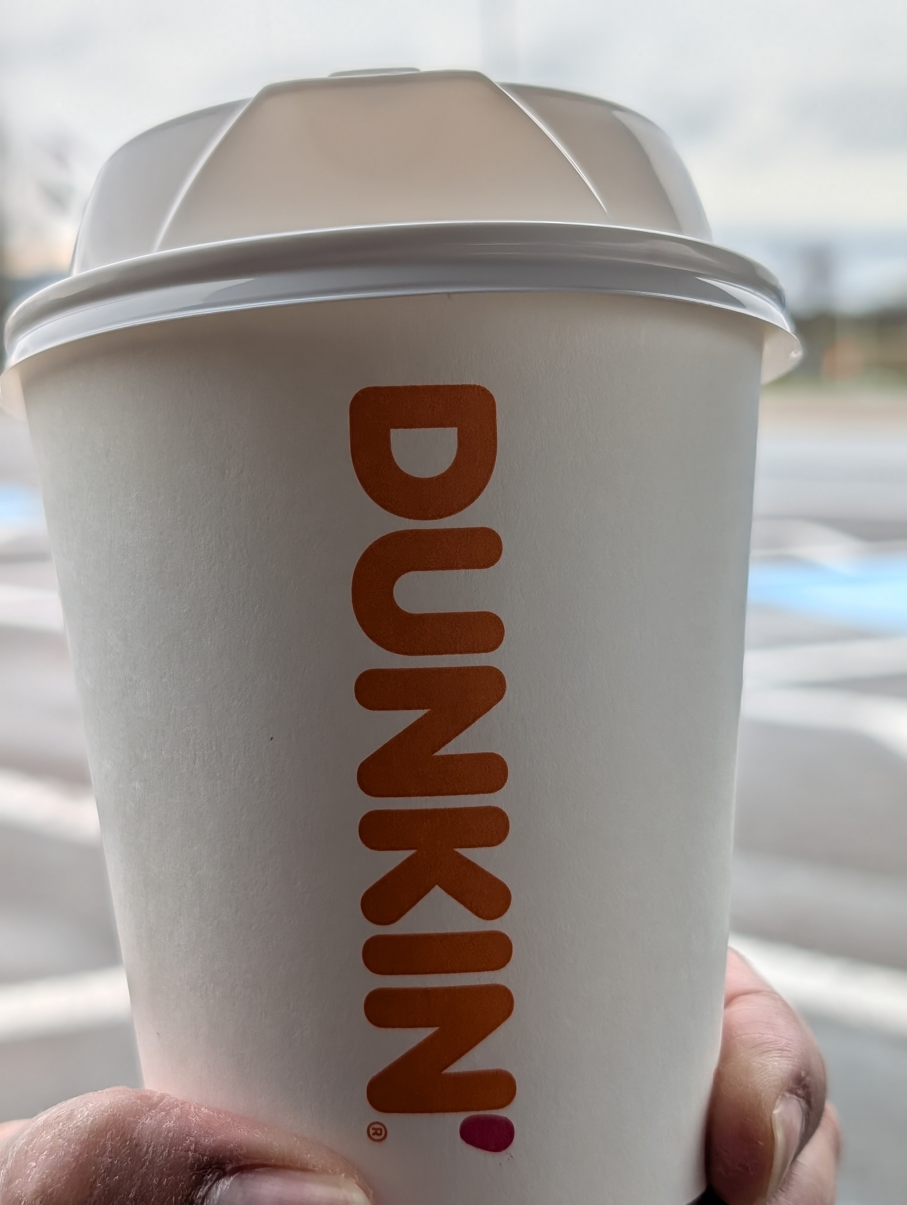 Having an espresso from a rest stop on the long drive home