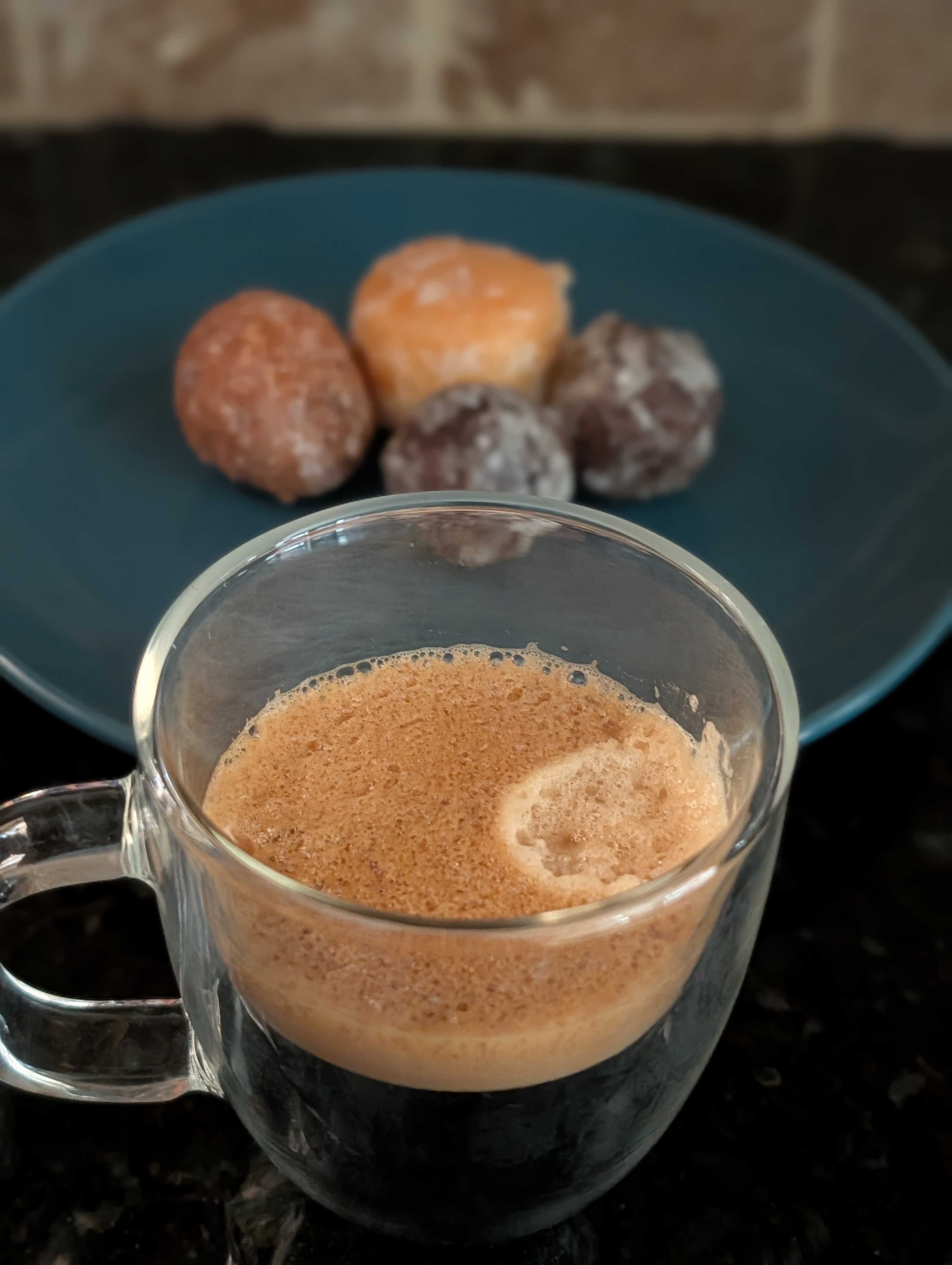 Finishing the last four donut holes on a cold, rainy Wednesday morning