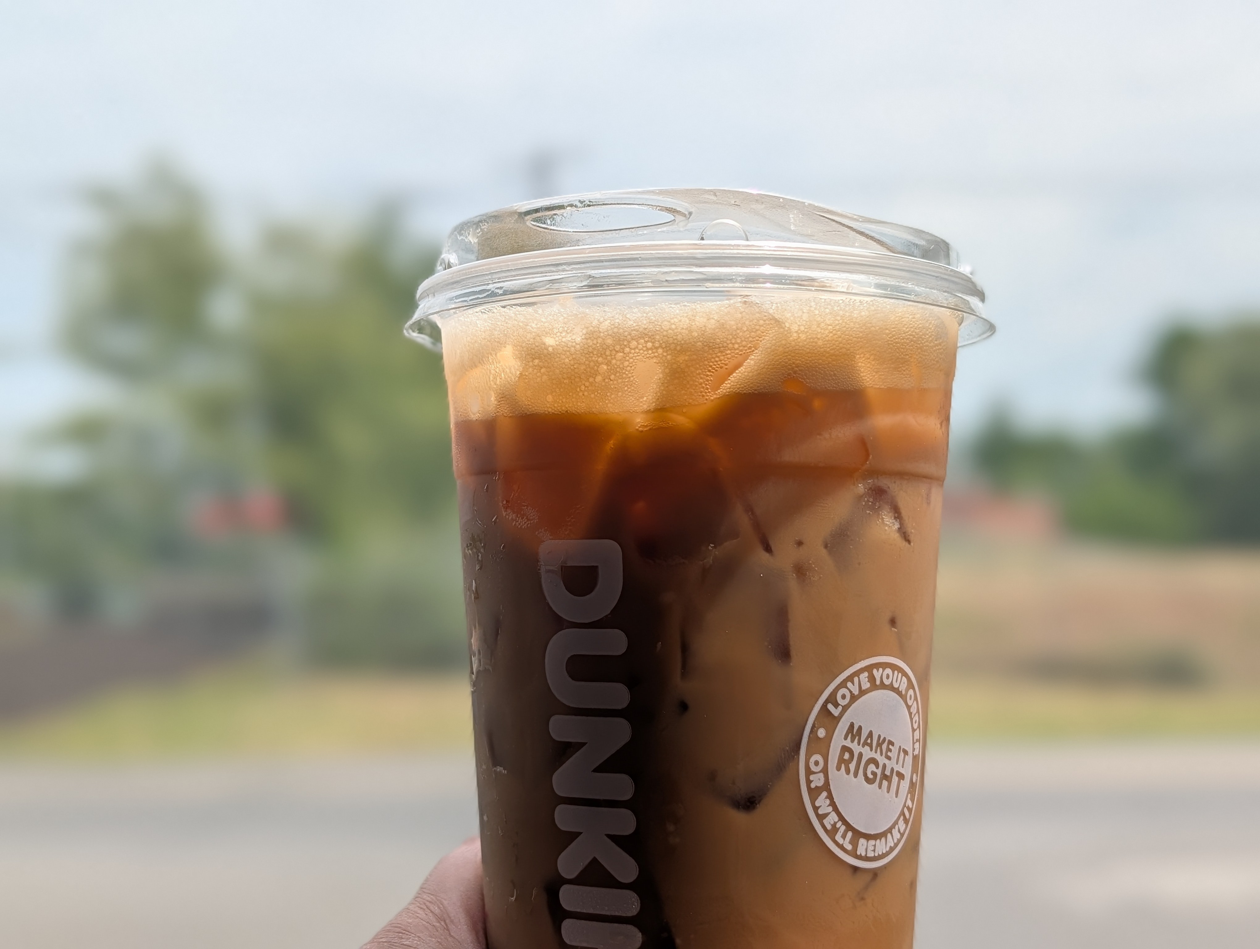 Grabbing a brown sugar shaken espresso from Dunkin after a long drive