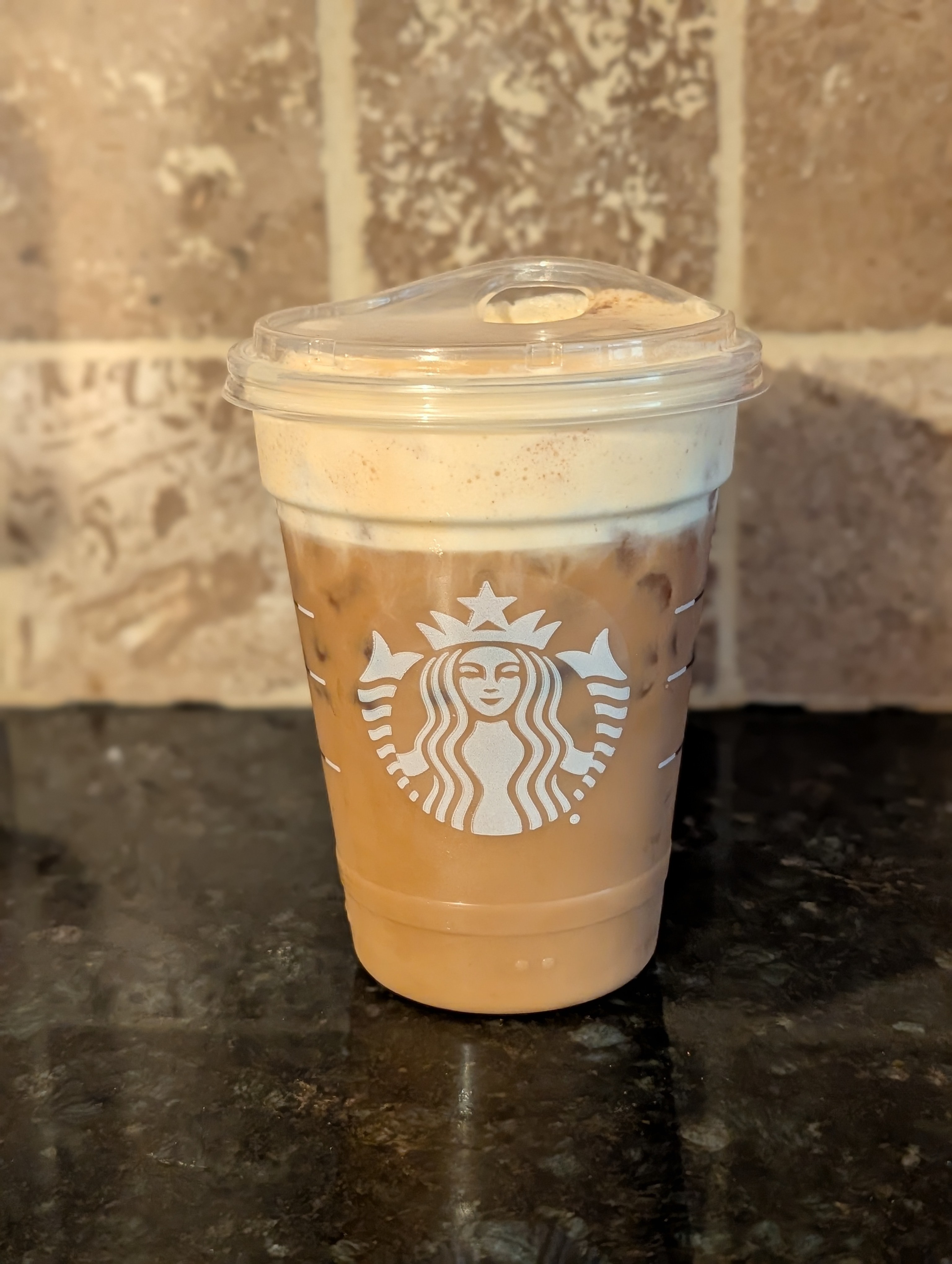 Enjoying an iced pumpkin cream shaken espresso before the first meeting