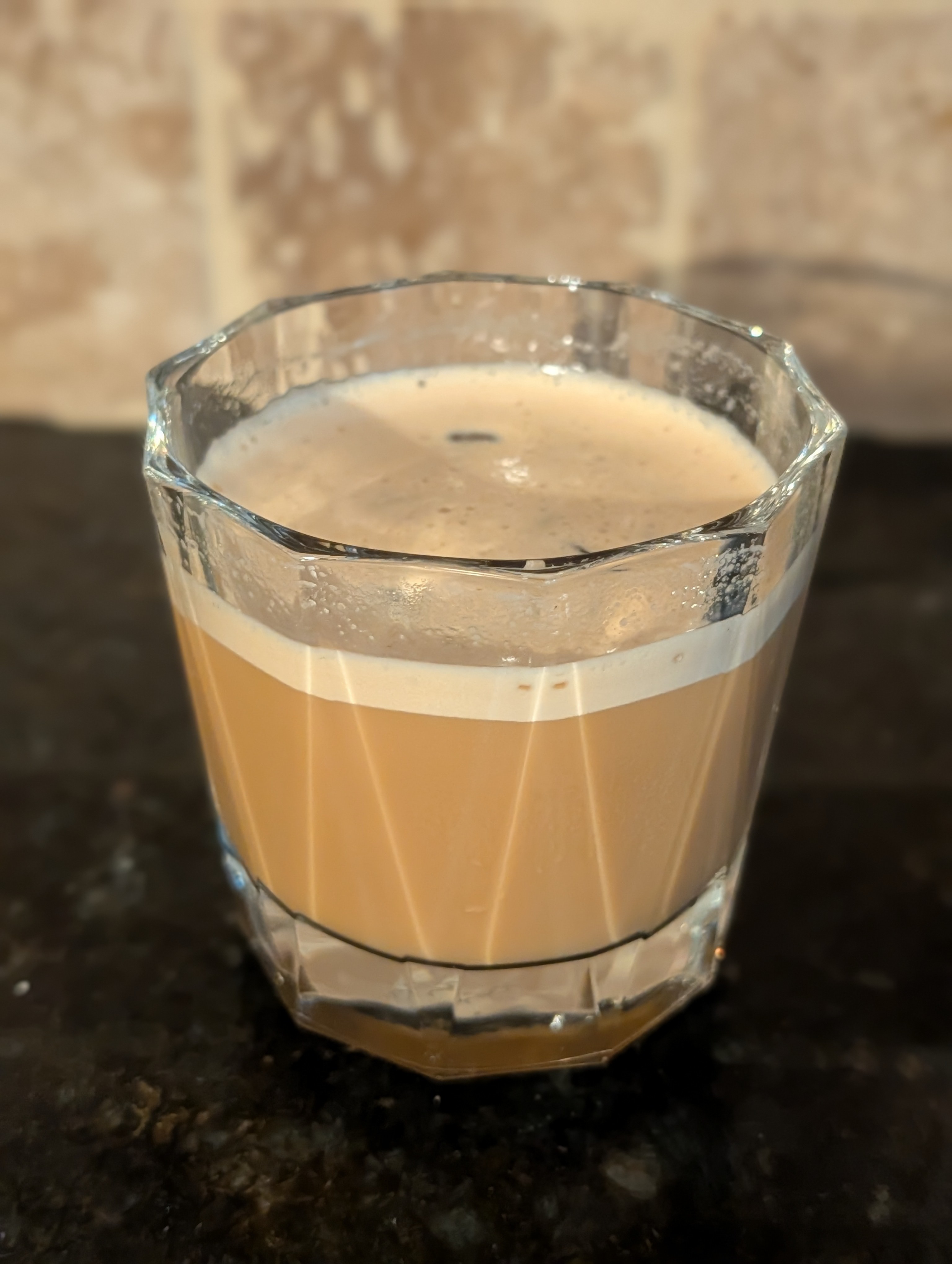 Mixing a little milk and brown sugar with a double espresso and ice.  Maybe I should have used less milk 🤔