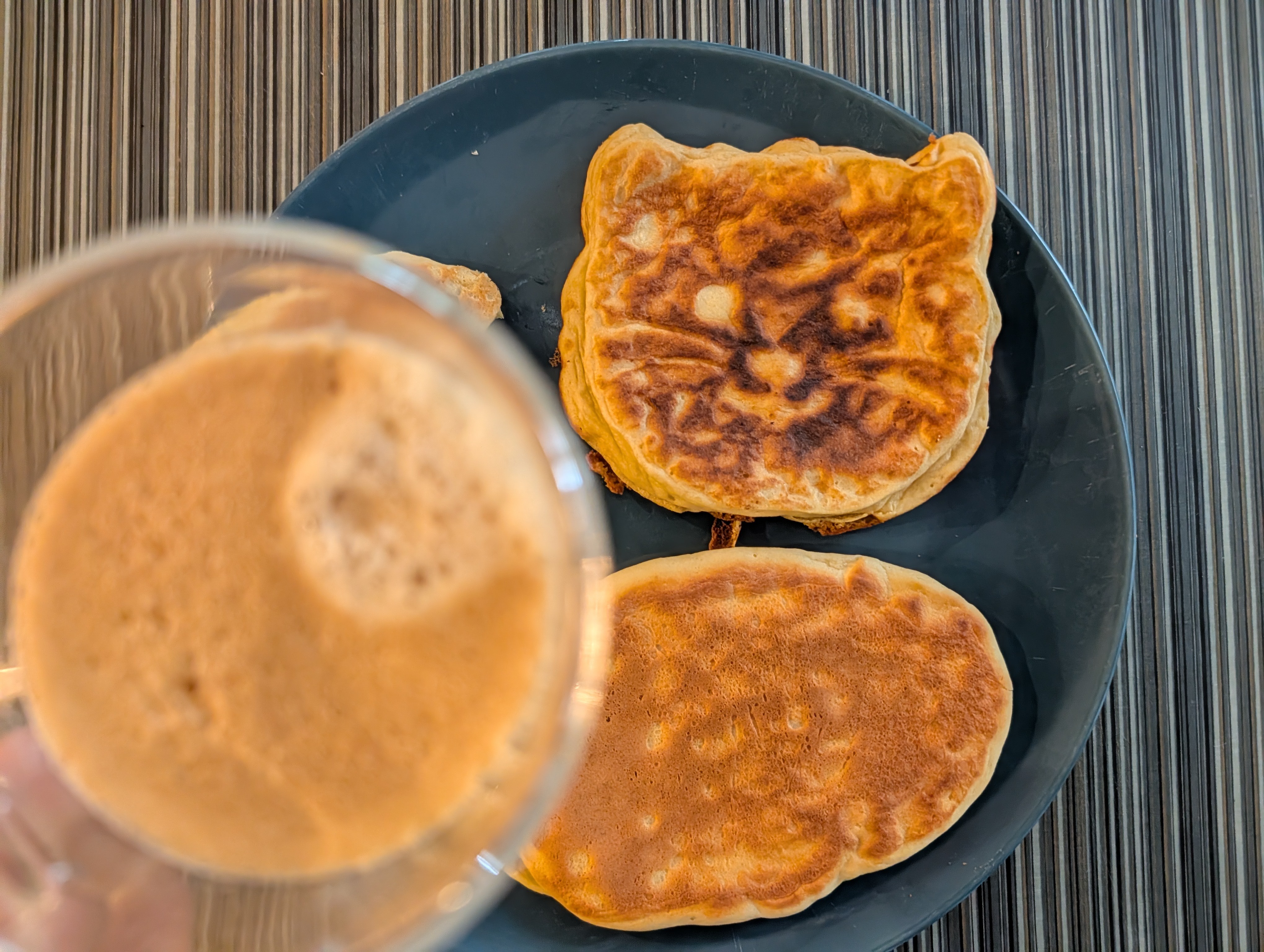 Having pancakes with coffee