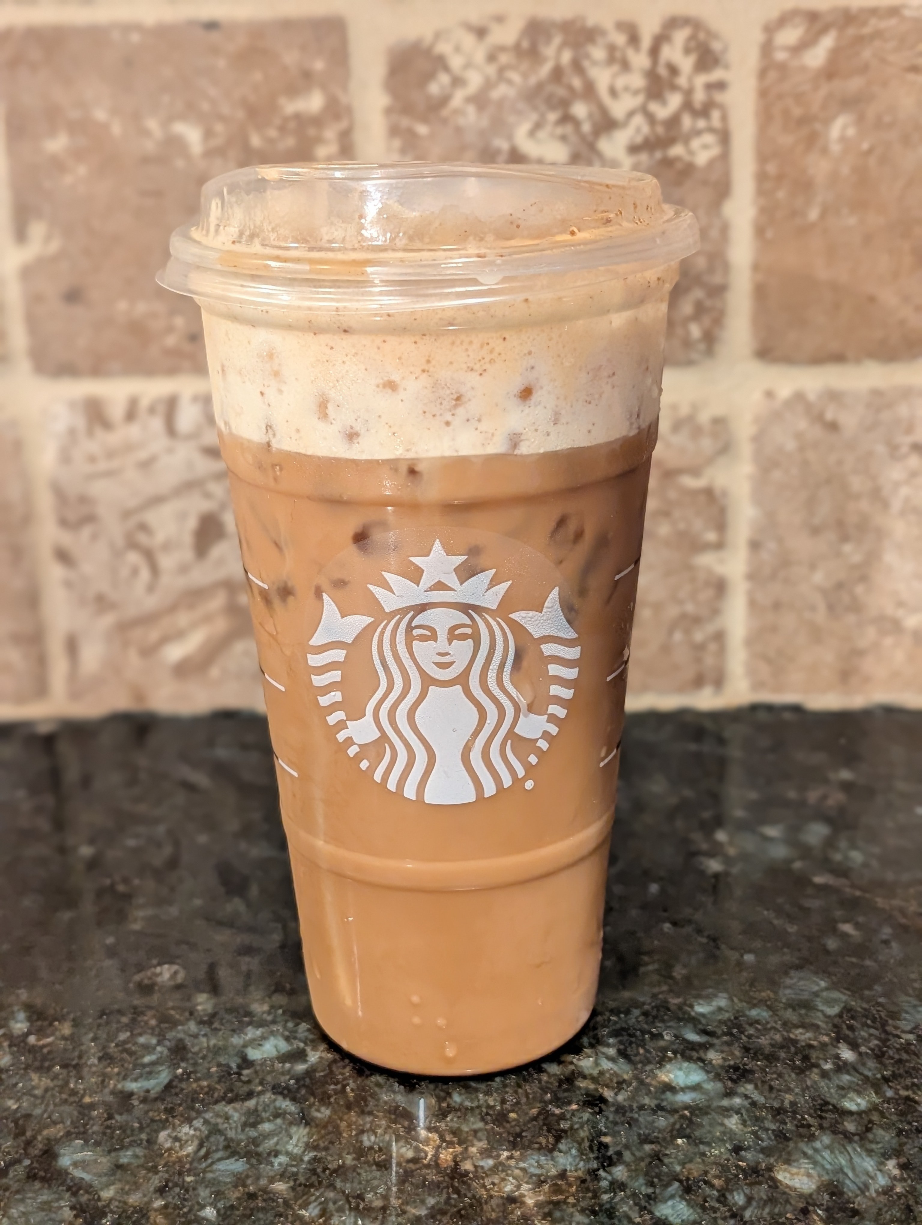 Enjoying a pumpkin cream shaken iced espresso on a really busy and rainy Friday