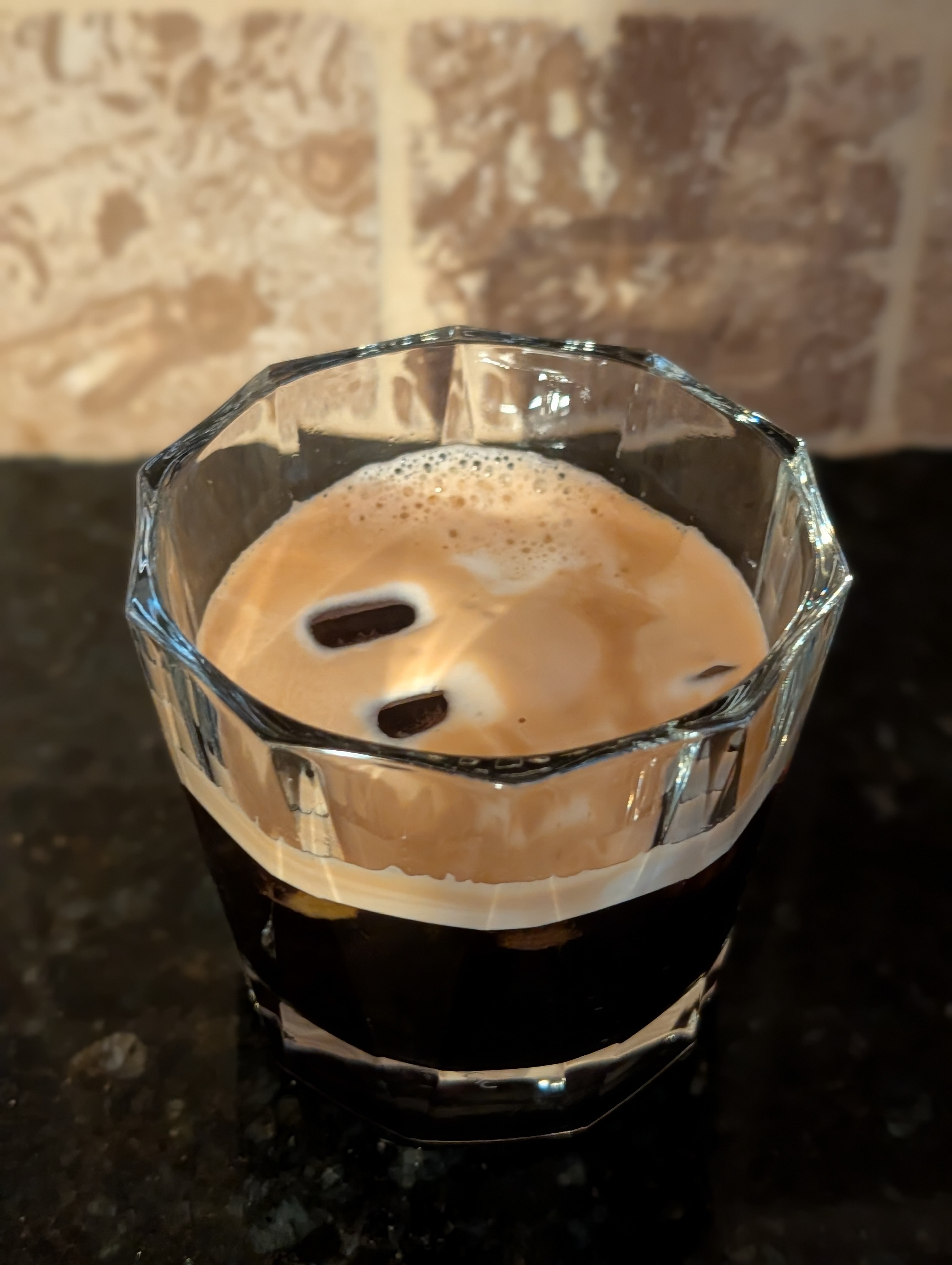 Having an iced espresso on a cold morning