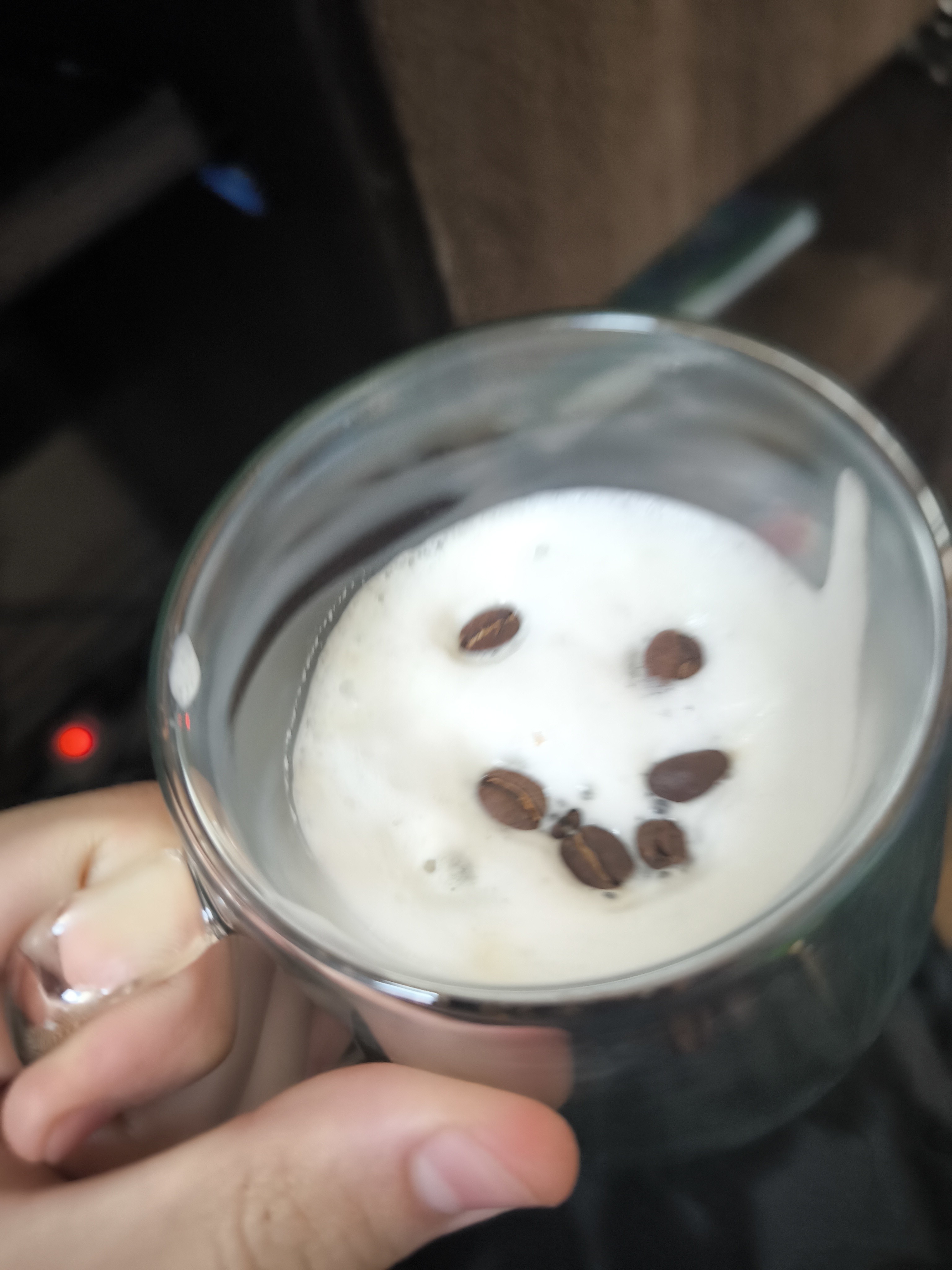 Fancy little coffee on a messy table