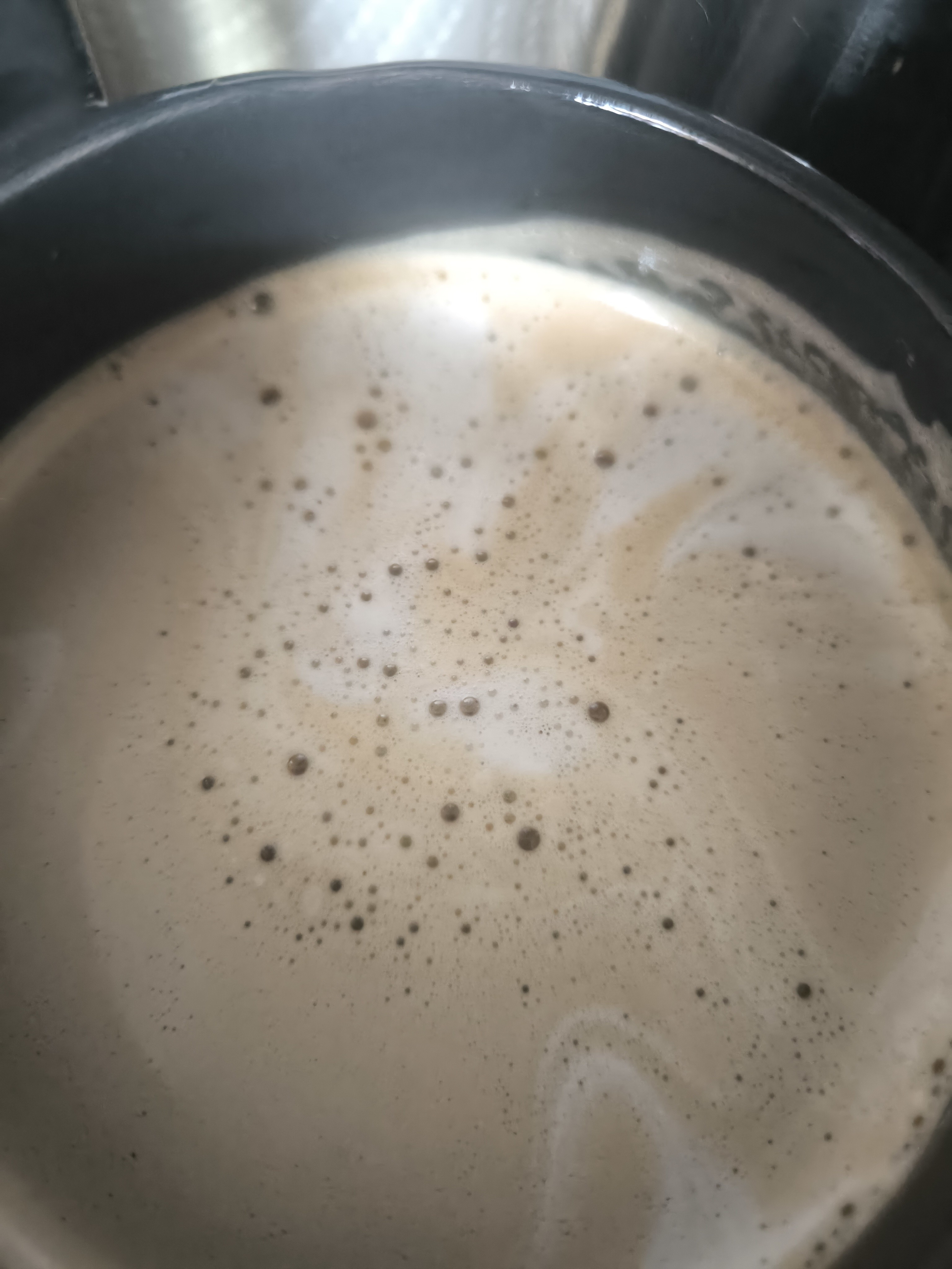 My first latte art was made accidentally and...kinda looks like a bunny?