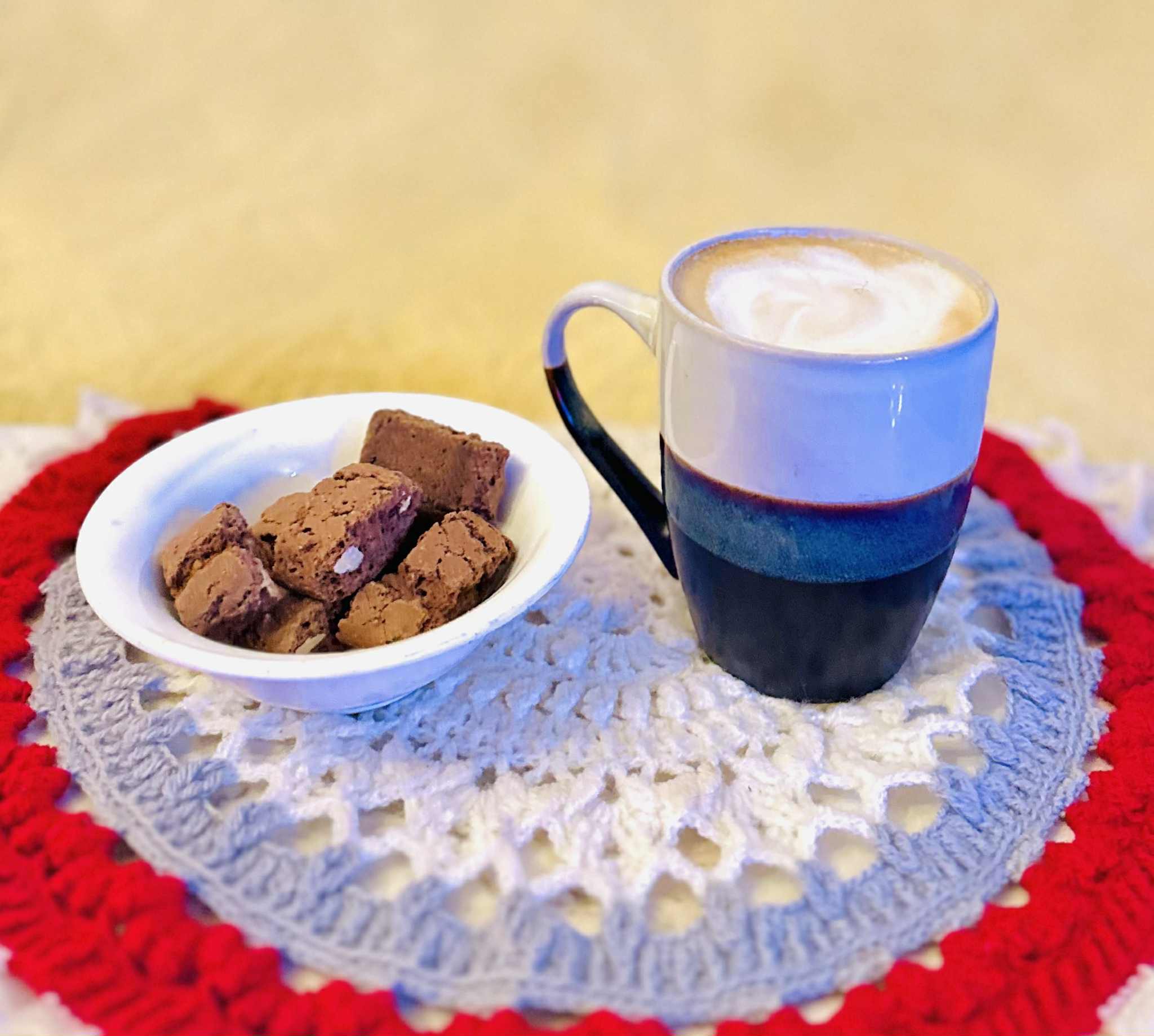 A homemade Capachinno with Moka coffee and a pieces of biscuits... 