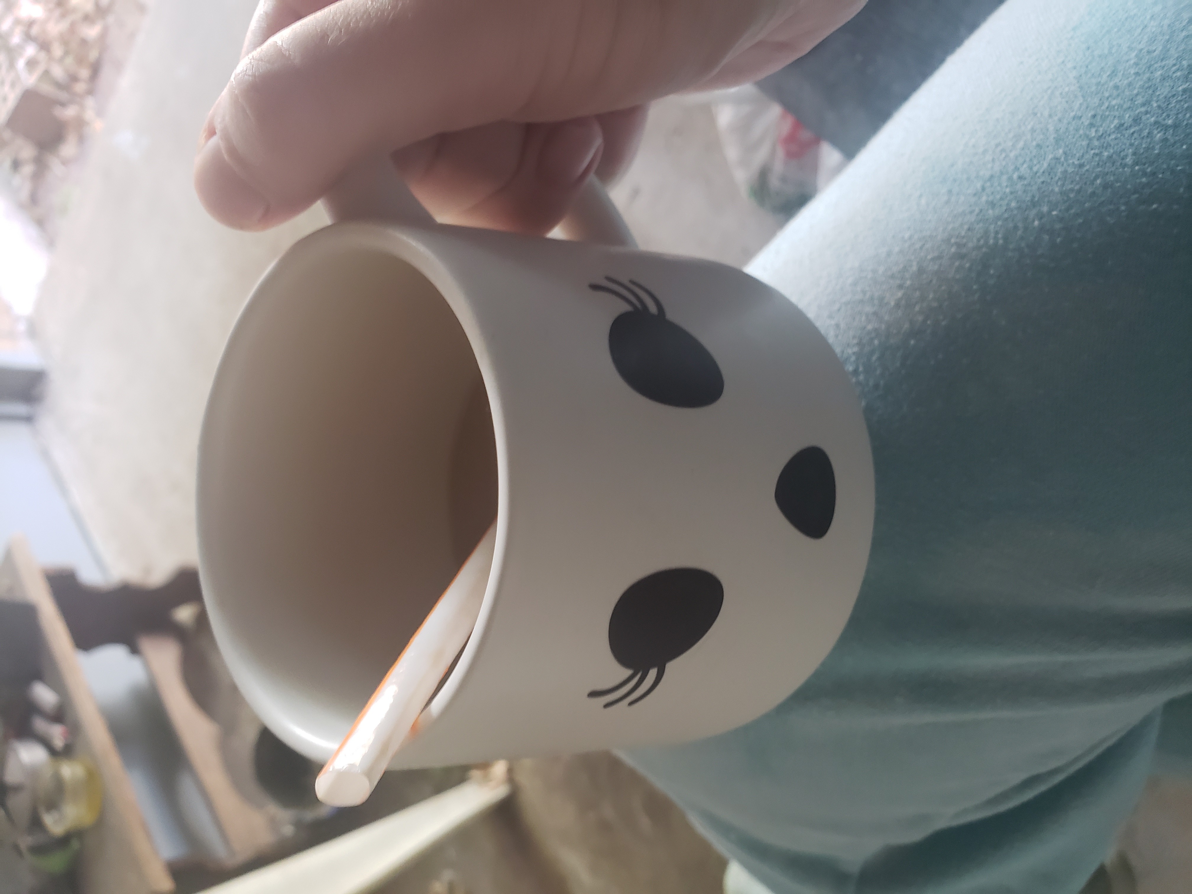 a sip of ghost coffee to enjoy