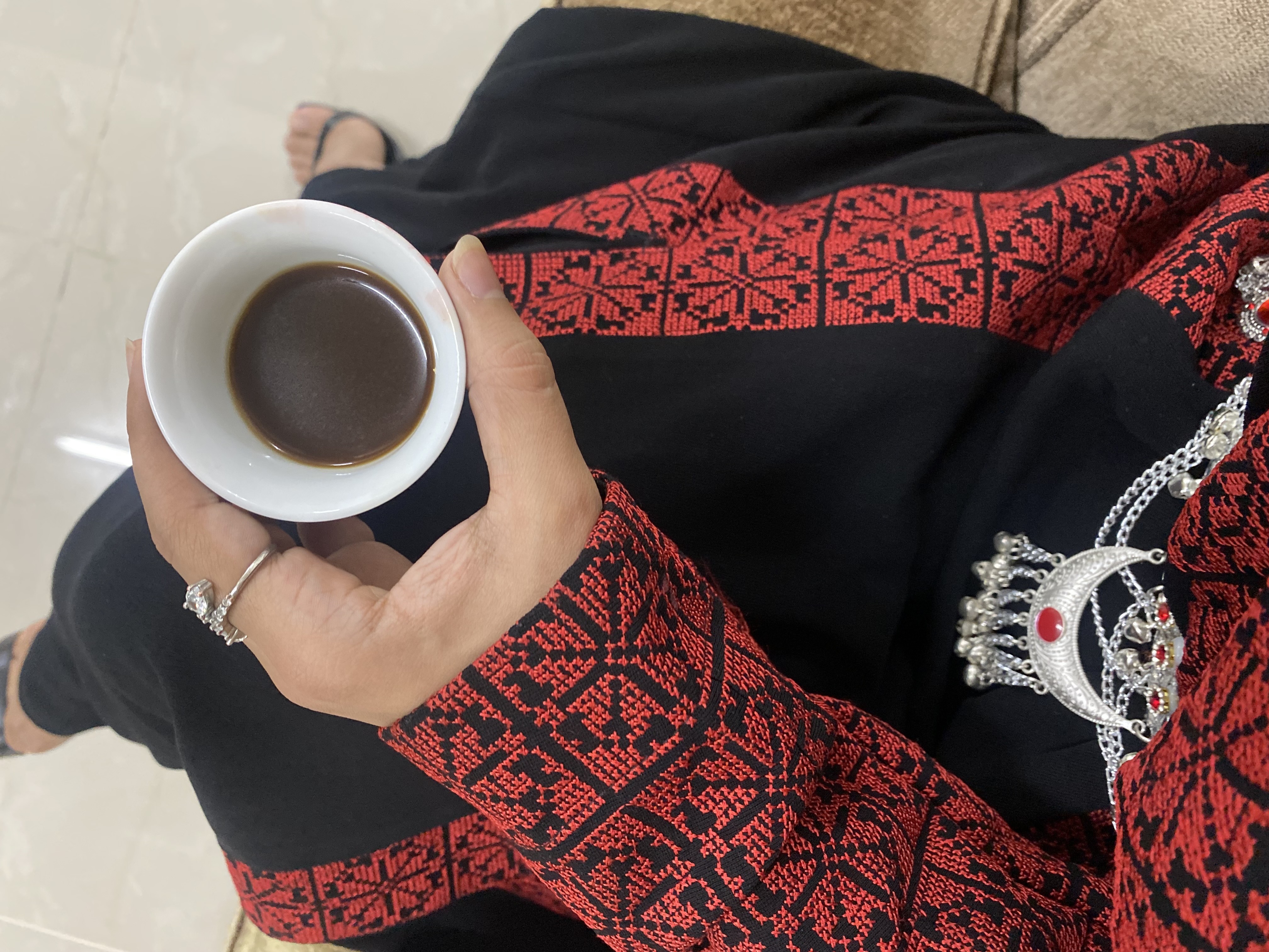 wearing a traditional dress from Jordan 🇯🇴 and drinking Jordanian coffee 🇯🇴🇯🇴❣️❣️❣️