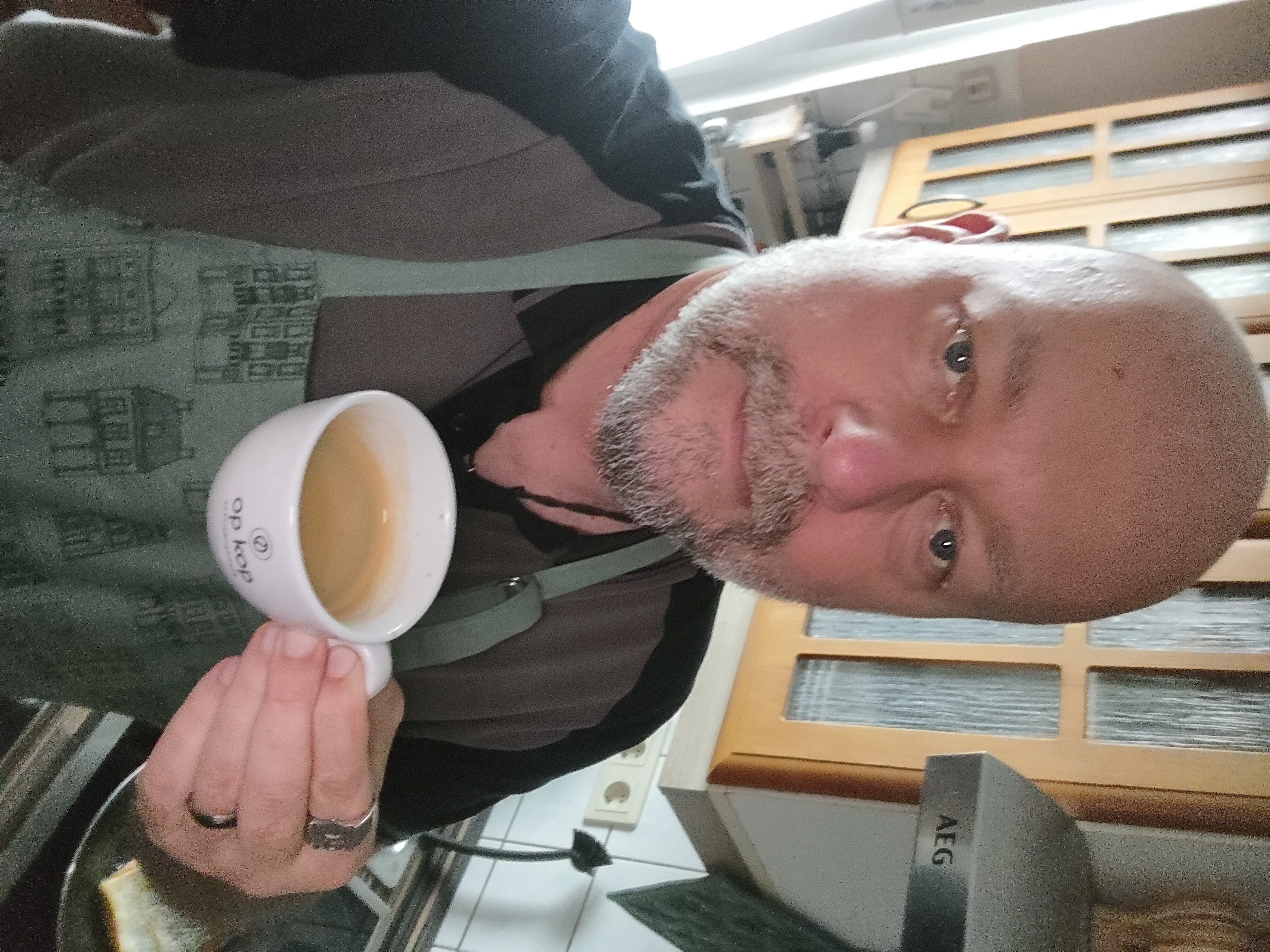 having coffee while preparing dinner for my younger daughter 