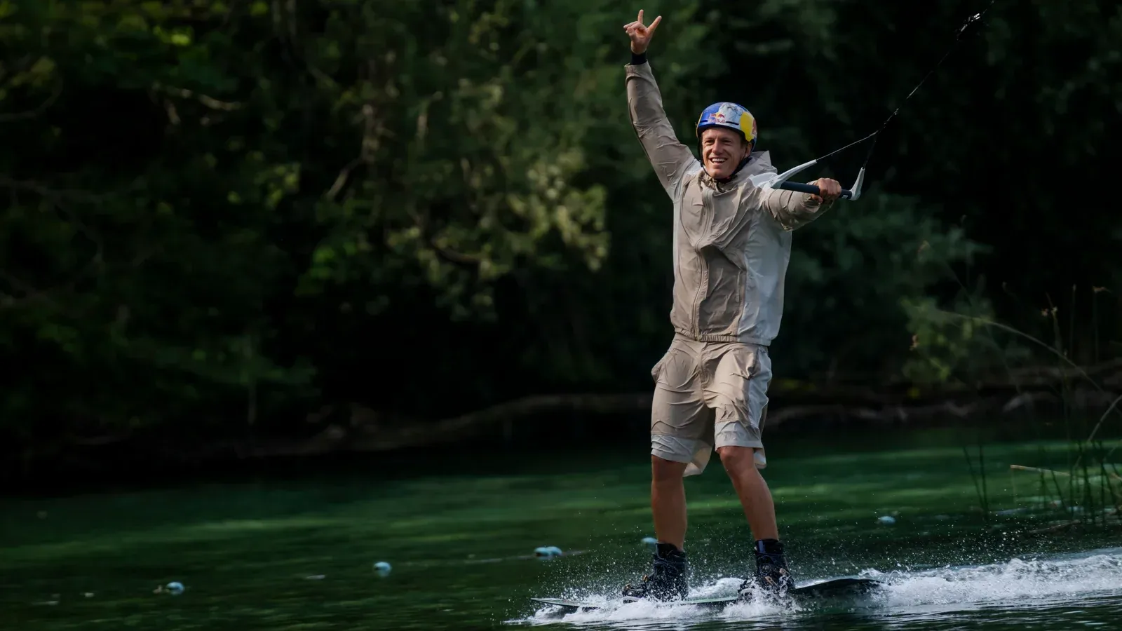 Wakeboarding champion Dominik Gührs riding on the Isar River during the Landshut droneboarding production.