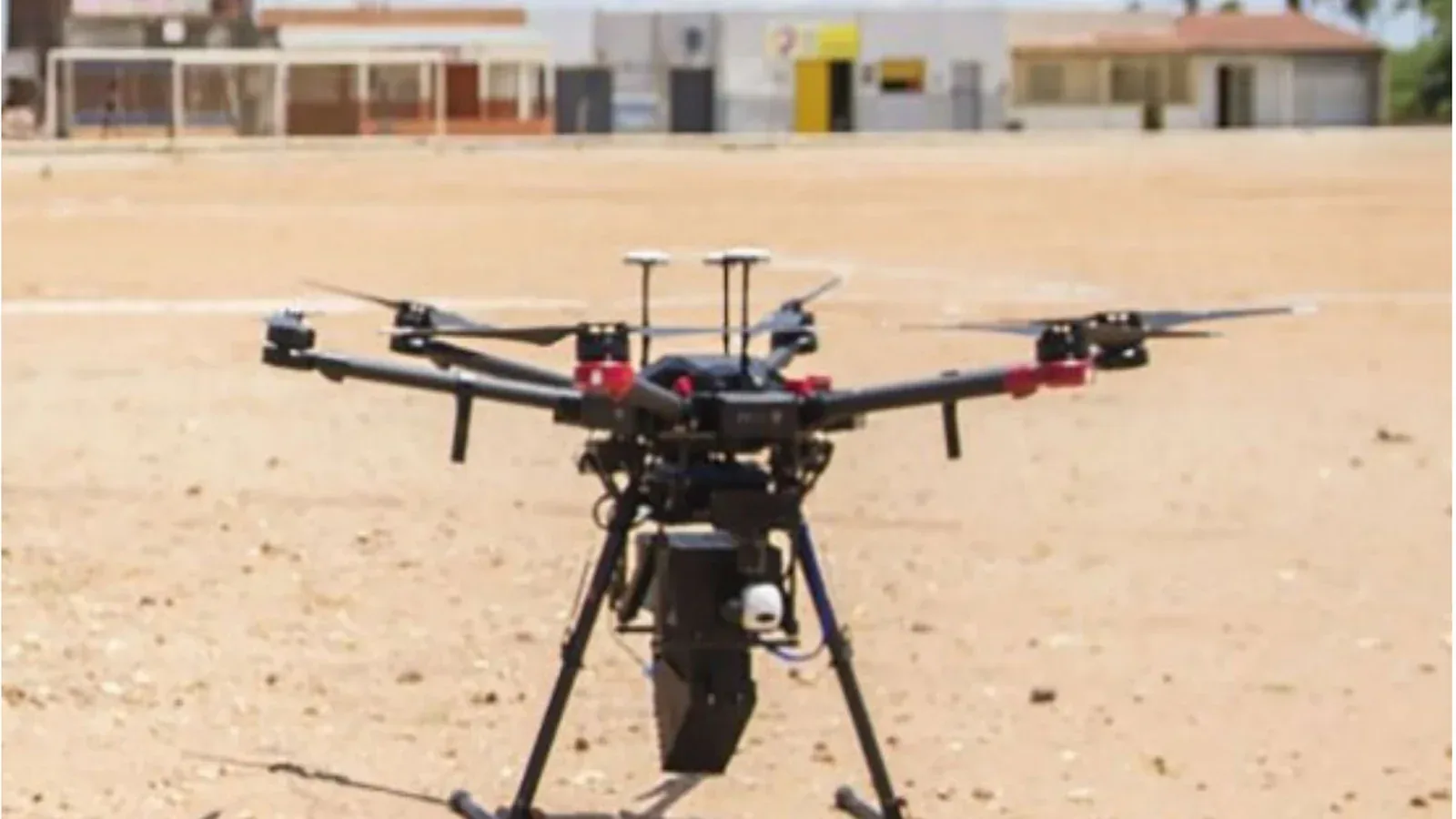 A DJI Matrice 600 Pro fitted with a sterile-mosquito release machine during a trial in Brazil.