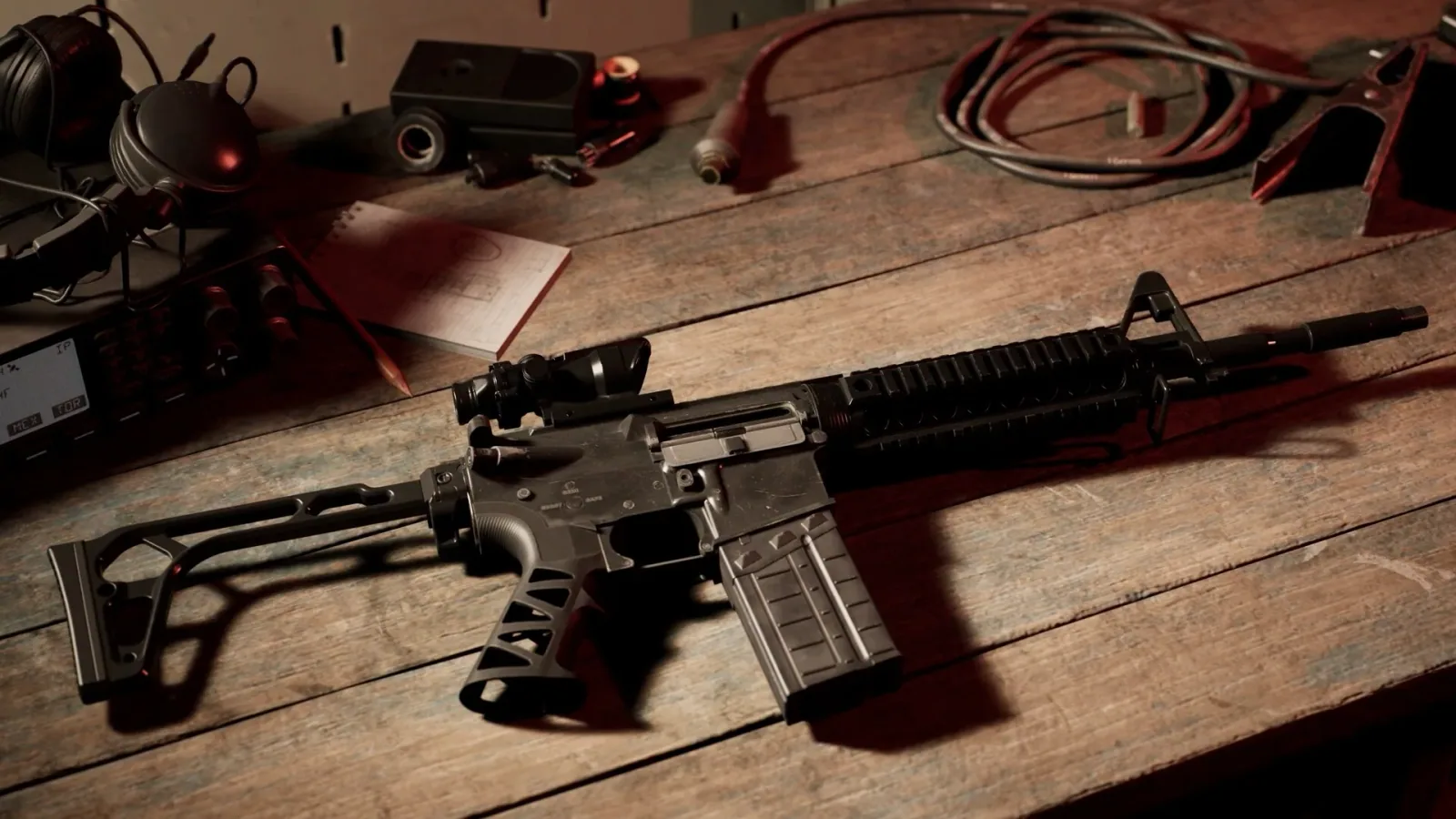 Official Bodycam promotional screenshot showing a rifle and attachment laid out on a workshop bench.