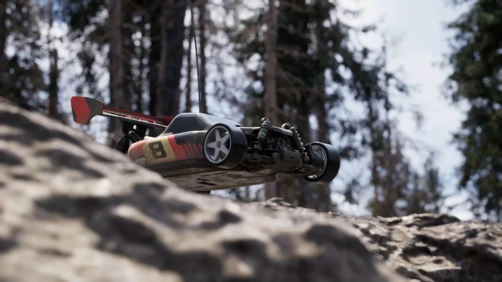Official Bodycam promotional screenshot showing a compact RC reconnaissance car on rough ground.