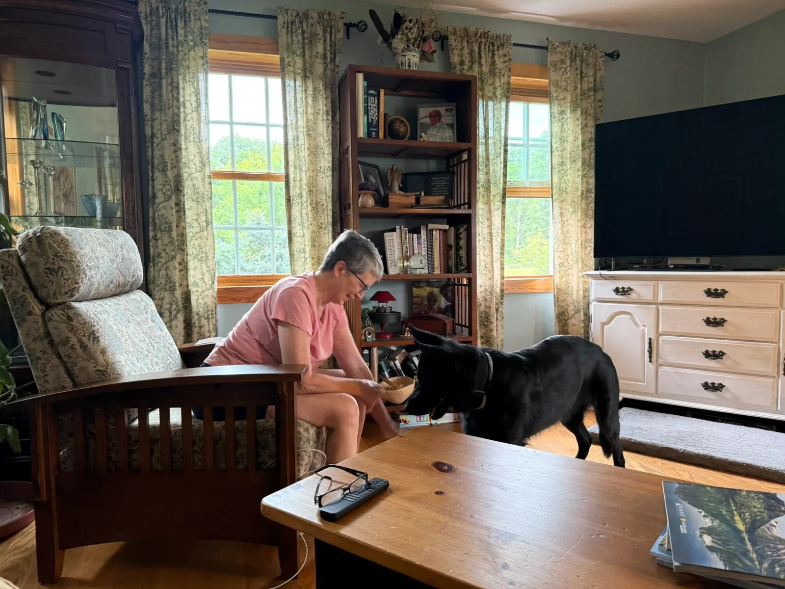 Colin's mom smiling as she spends time with Vanya.
