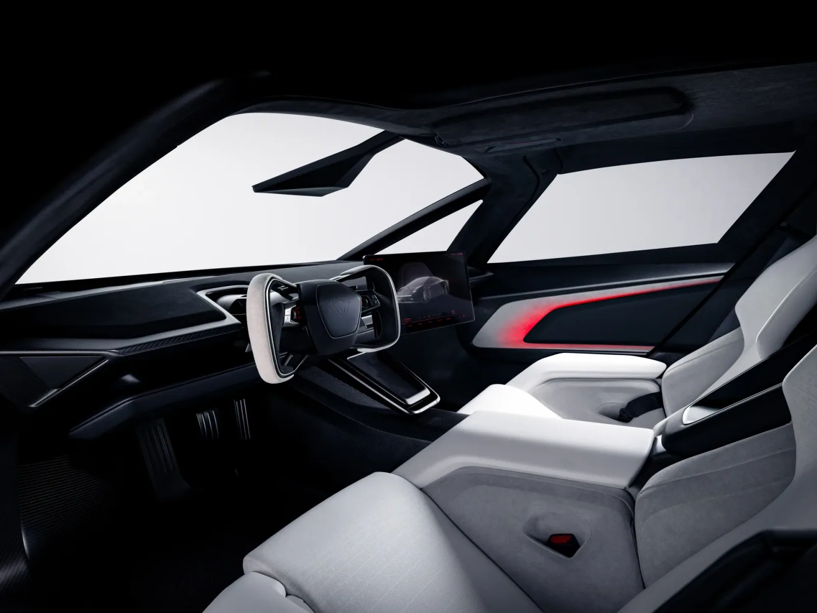 Cabin view showing the yoke, central screen, and passenger seat.