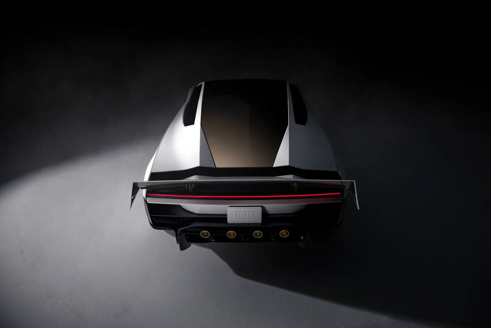 Elevated rear view with the wing raised.