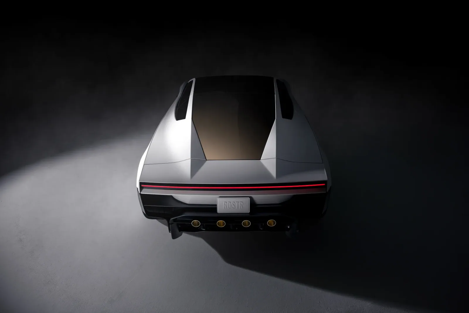 Elevated rear view with the wing lowered.