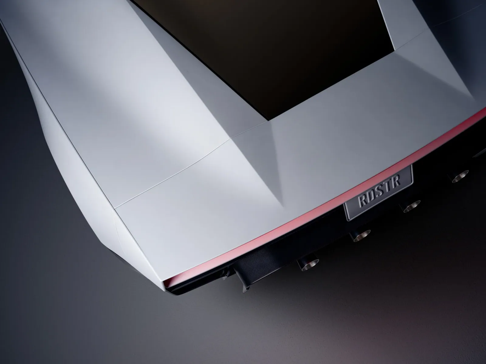 Close-up of the rear bodywork, glazing, and light bar.