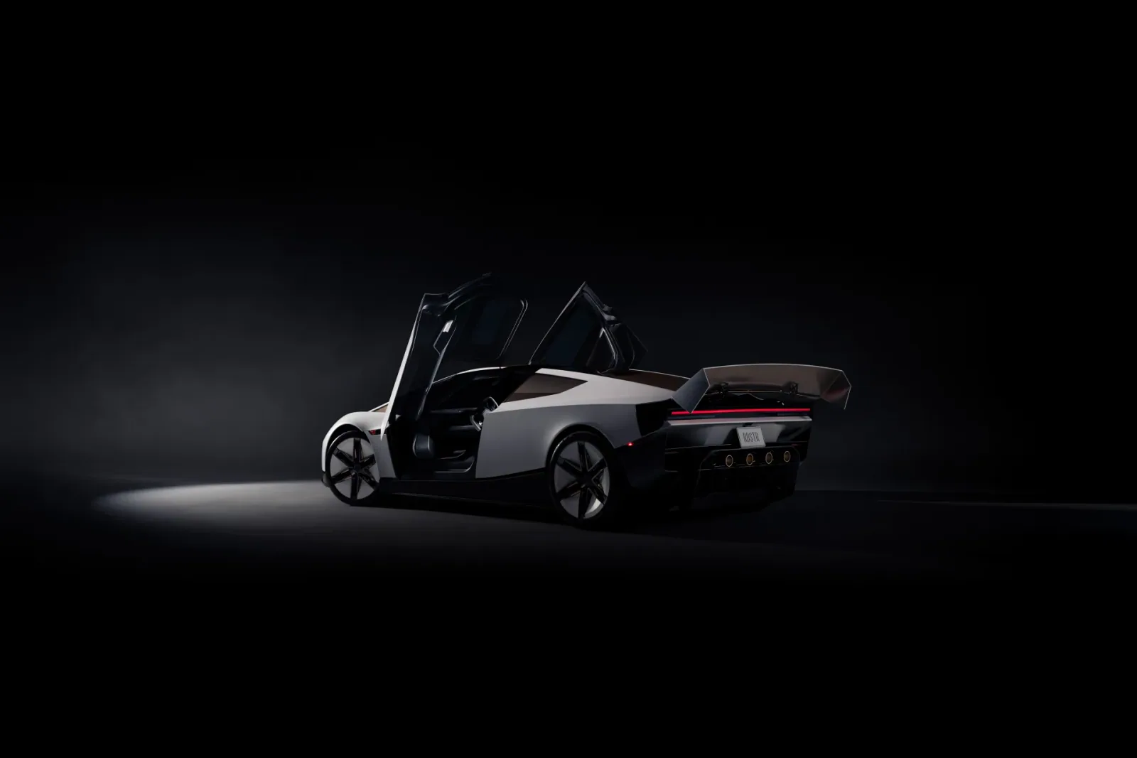 Rear three-quarter studio view with the doors raised.