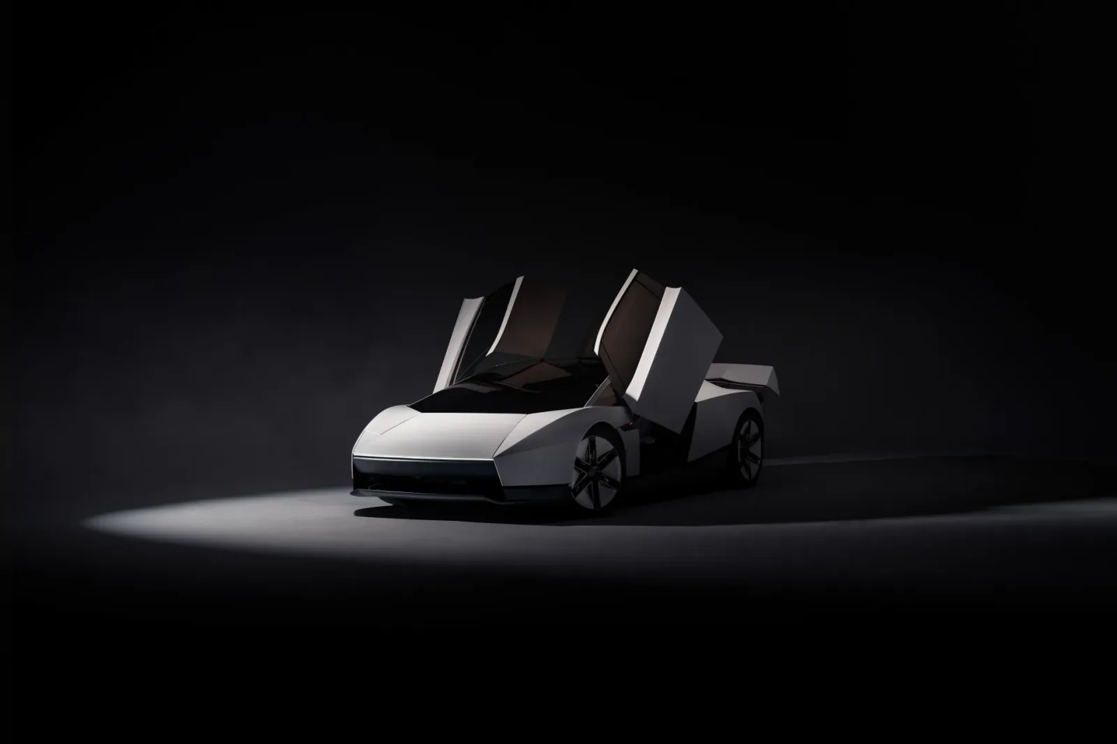 Front three-quarter studio view with the doors raised.