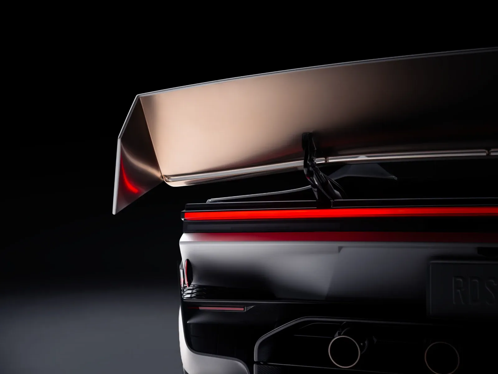 Close-up of the raised rear wing and its supporting mechanism.