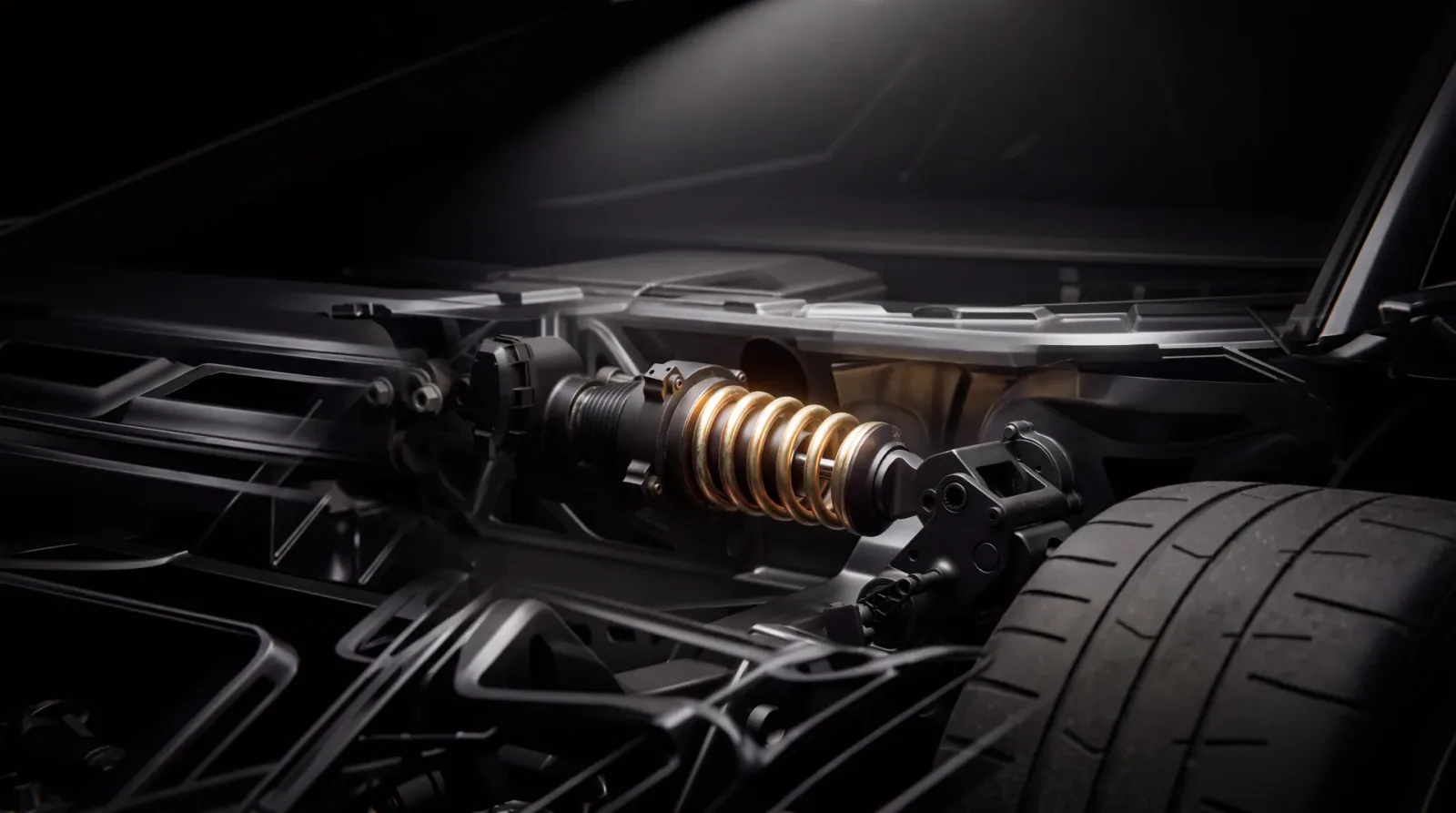 Exposed chassis and suspension detail supplied in Tesla’s media kit.