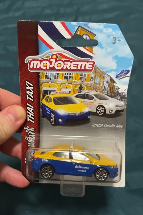 Toyota Corolla Altis (Yellow Blue)