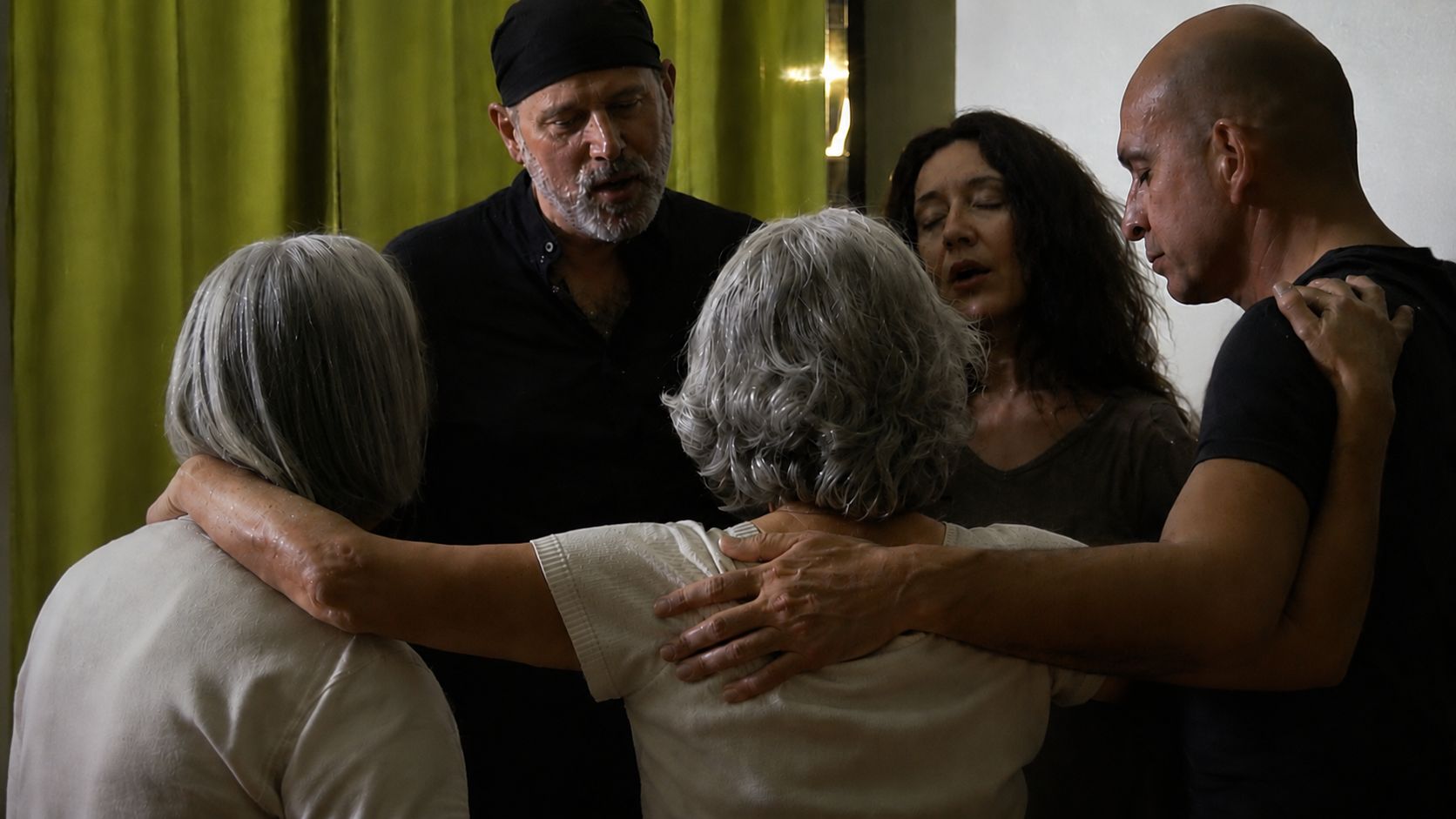 Alex Tarolo shares a moment of connection with participants during an Ecstatic Dance experience.
