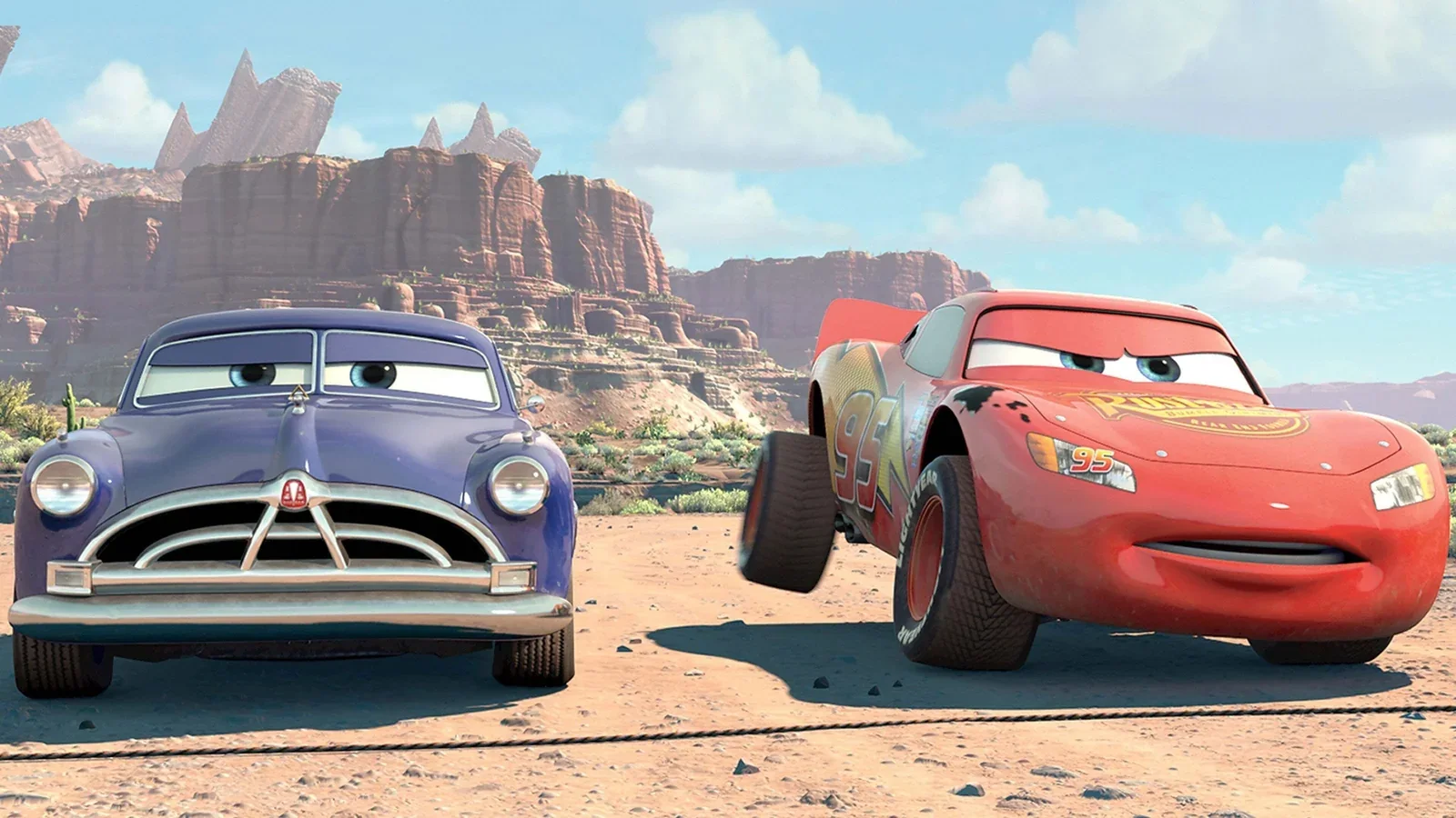 Doc Hudson frente a Rayo McQueen