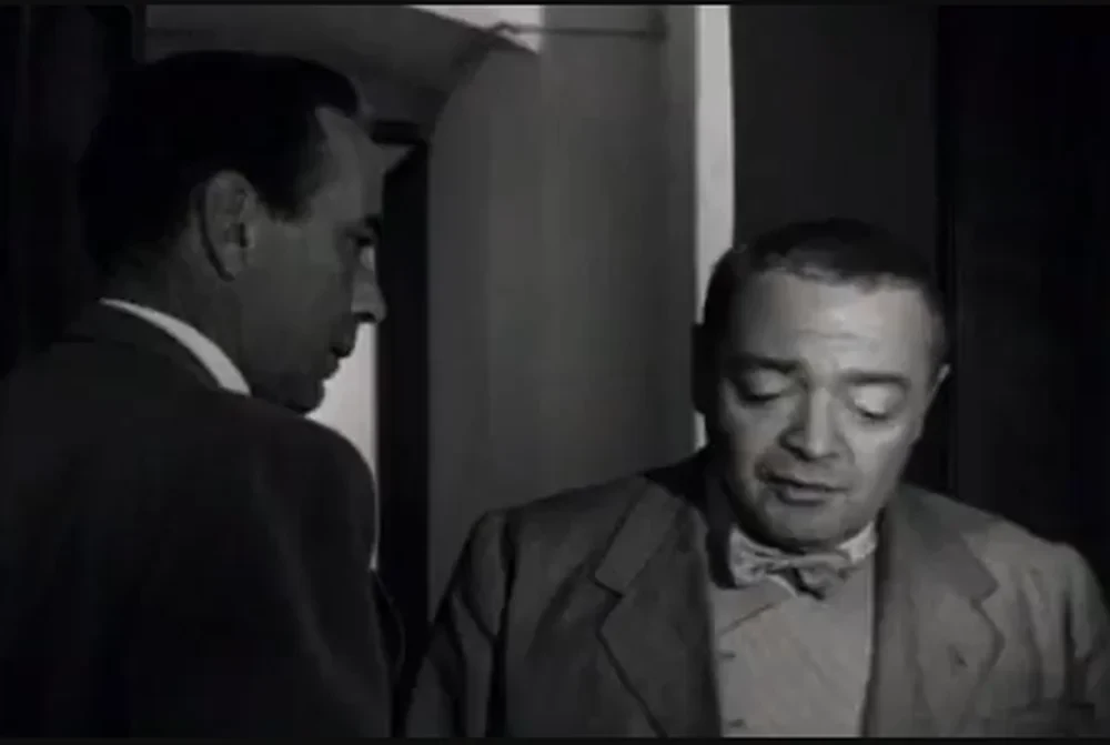 Humphrey Bogart y Peter Lorre en La burla del diablo