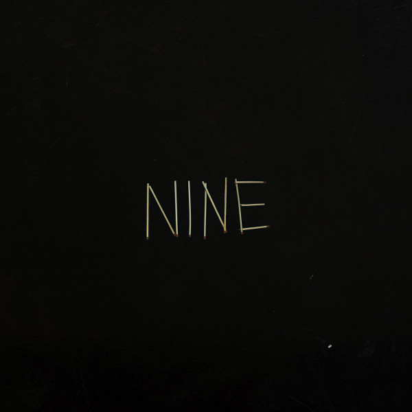 NINE cover art