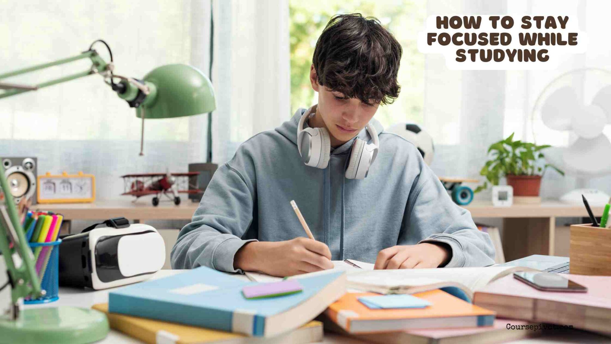 Student staying focused while studying with books and notes