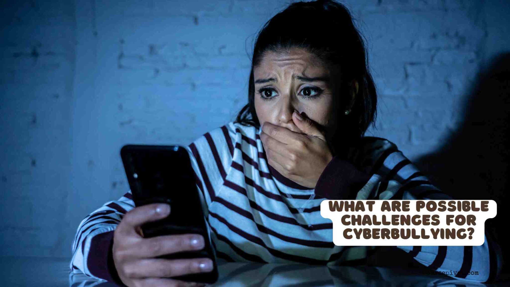 Adolescent looking worried while reading messages on a phone