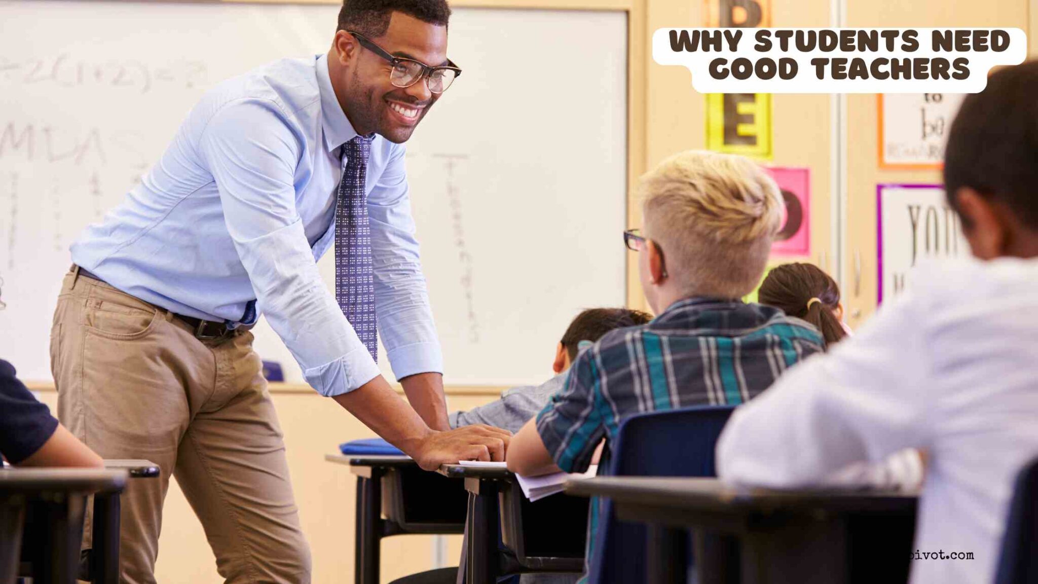 Teacher helping students understand a lesson in a classroom