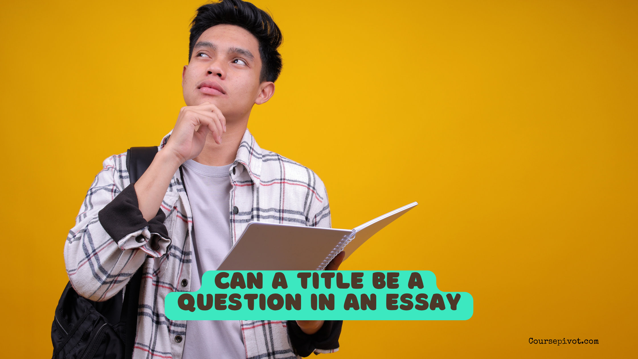 Student writing an essay title on paper, deciding whether to phrase it as a question