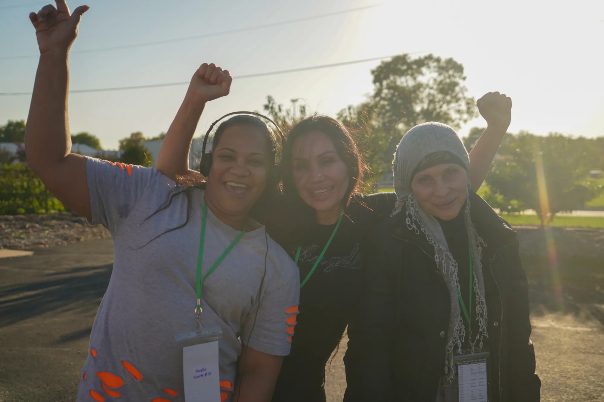 Three women smiling together at Lifeline Wellness Institute