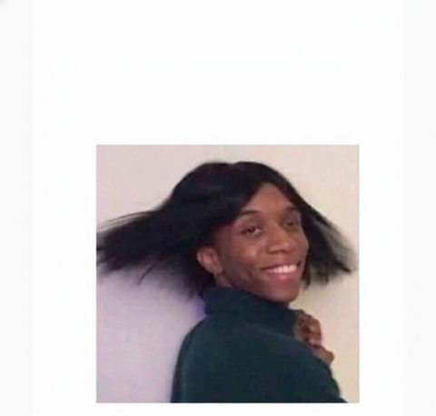Smiling Person with Flowing Hair