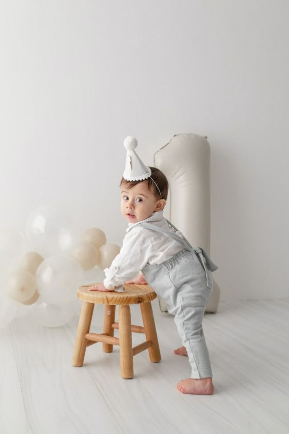 Baby Playing With Birthday Props