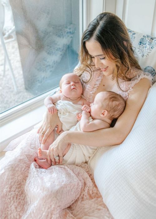 Parents Holding Both Babies