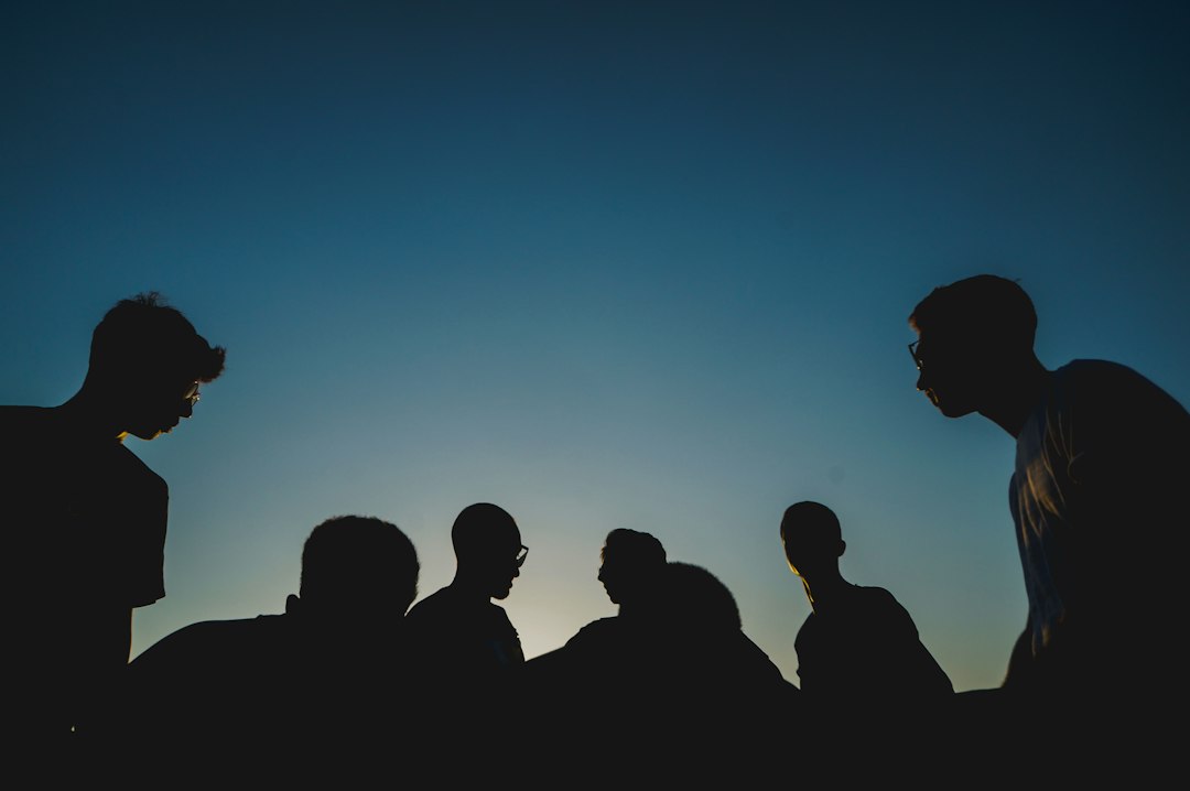 Latino men in leadership conversation