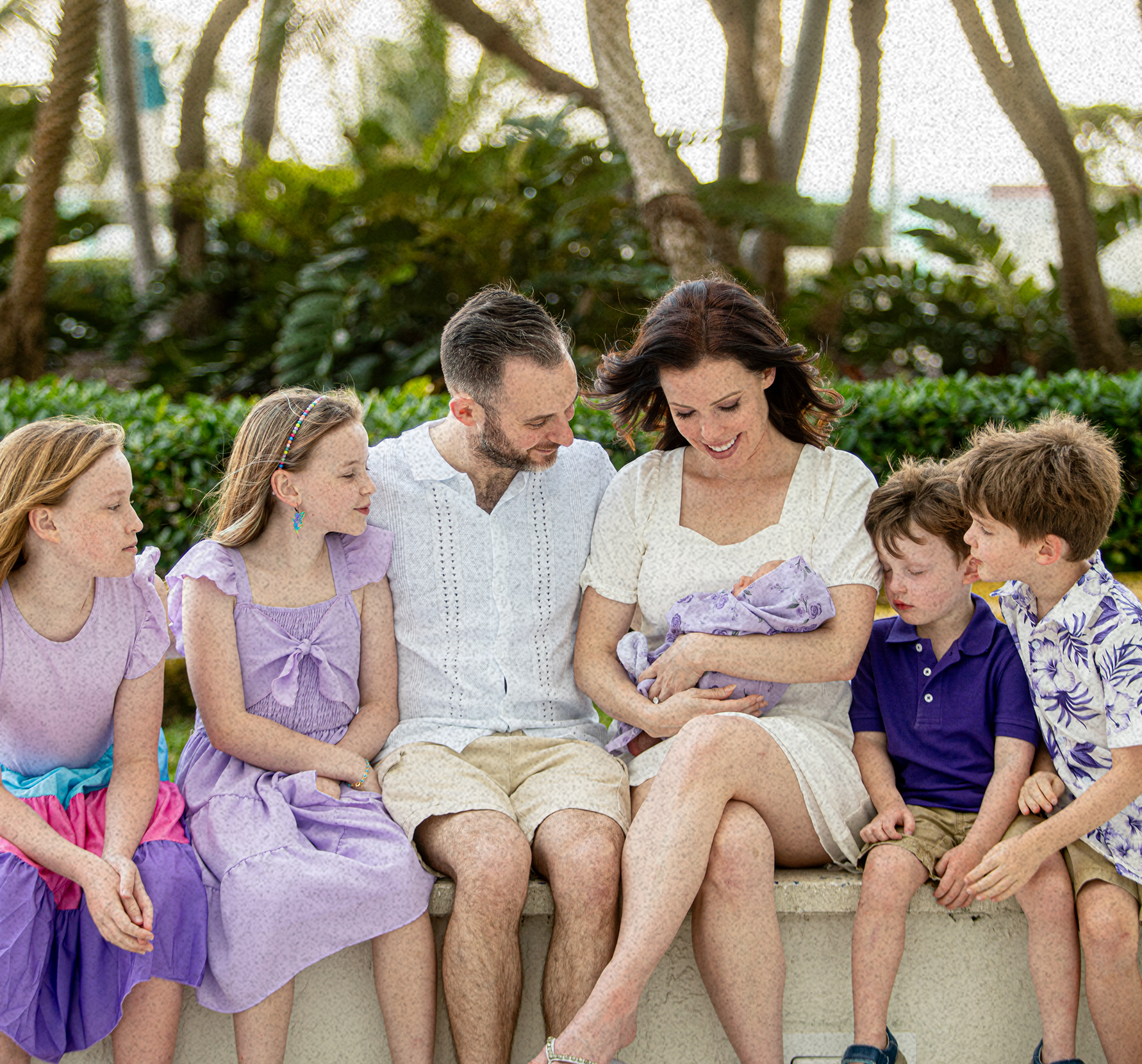 Dr. Laura Purdy with her family - balancing medicine, motherhood, and entrepreneurship