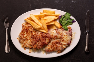 Breaded veal escalope with smoked beef and cheese