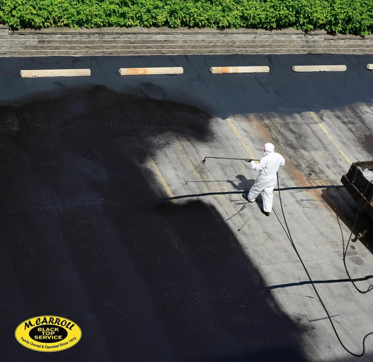 Asphalt Sealcoating Process