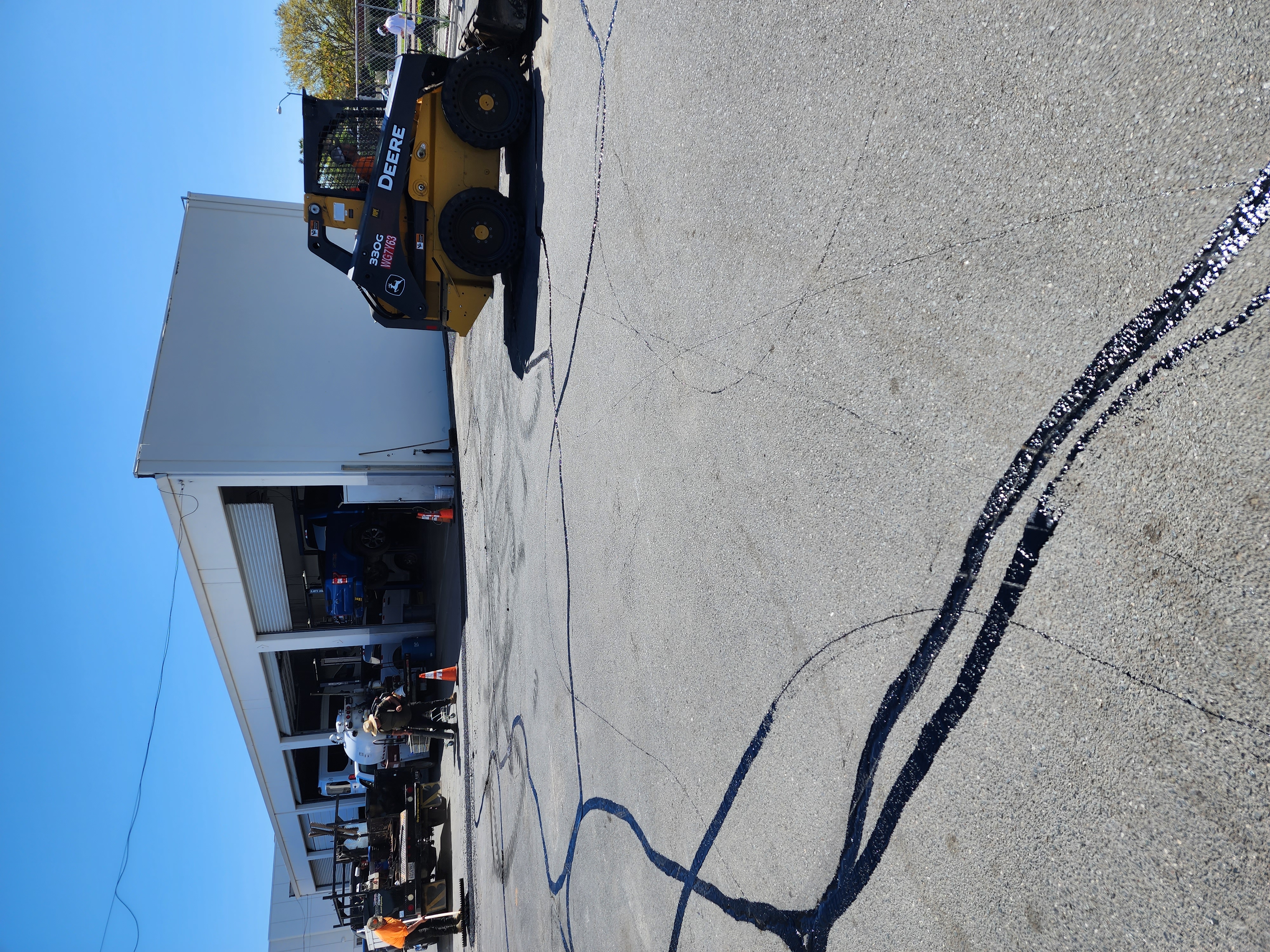 Asphalt crack filling and sealing parking lot