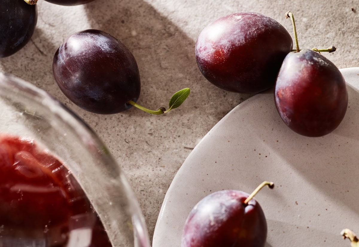 figs on a table scattered on a plate, close up shot
