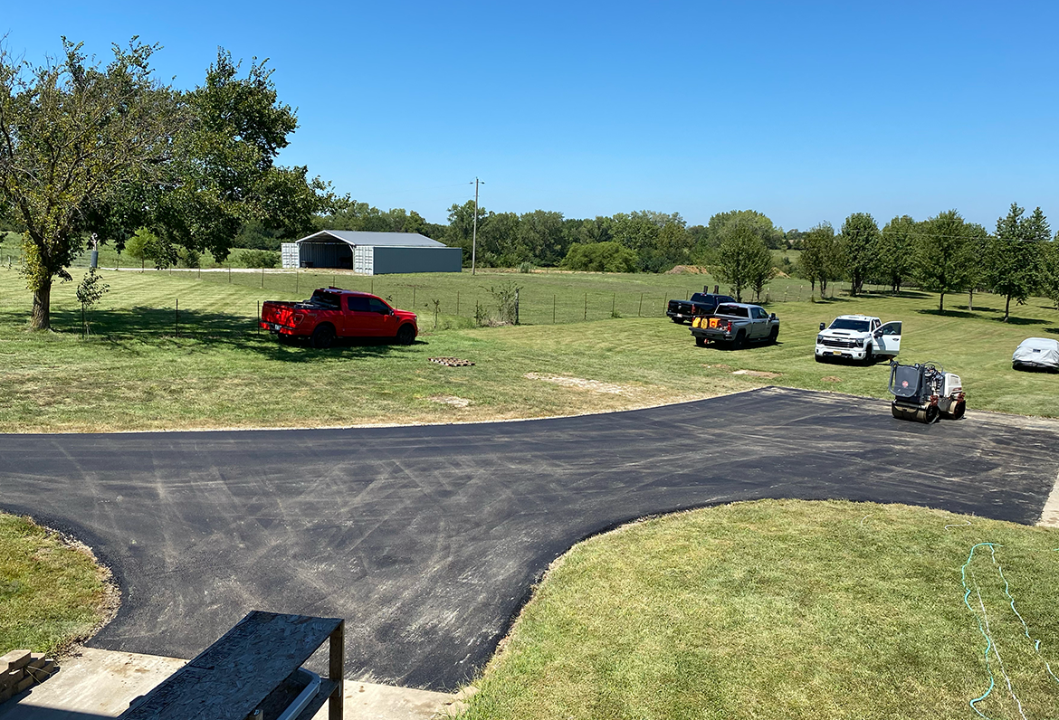 Working on a Large Residential Asphalt Driveway